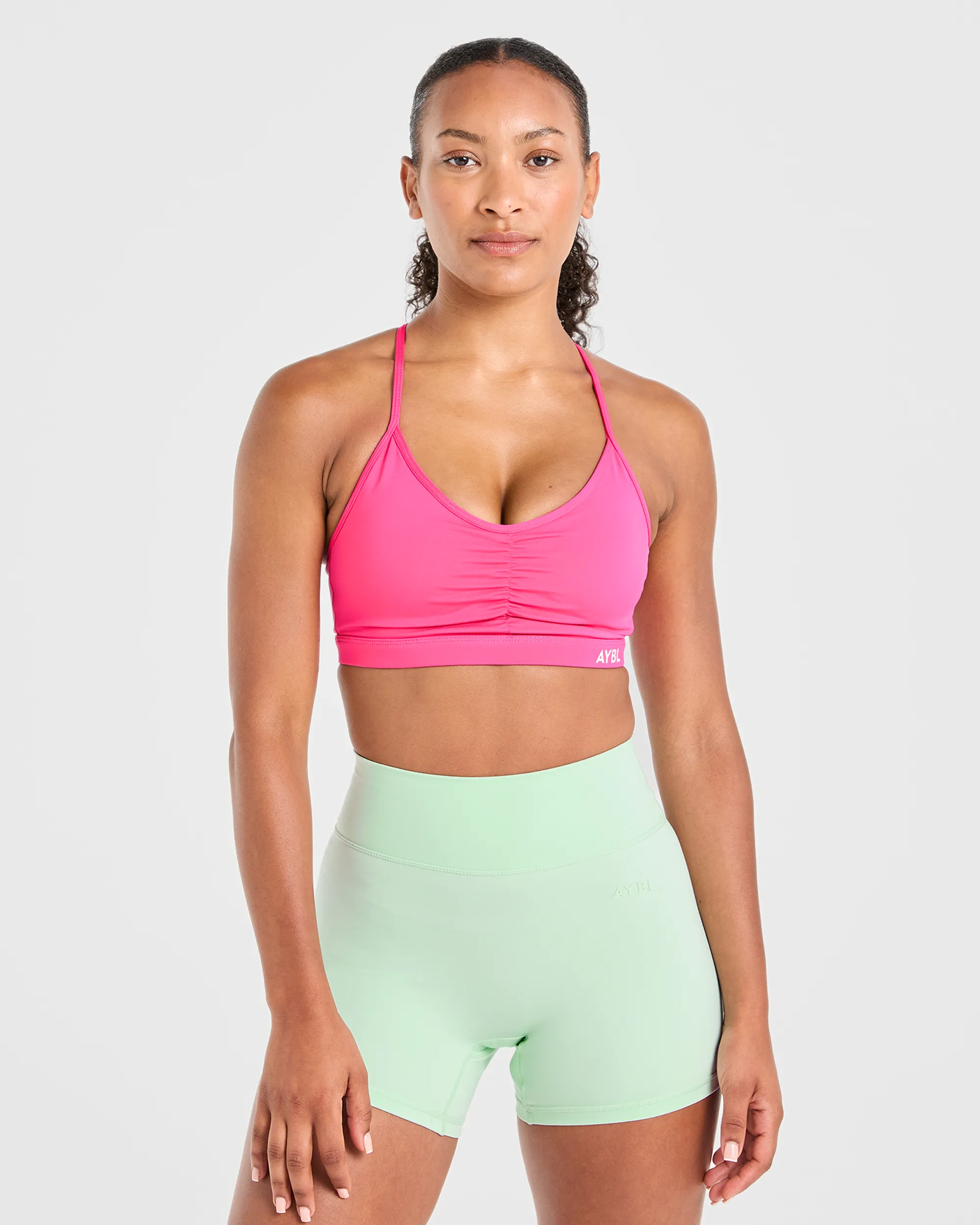 Multi Directional Stretch Non Restrictive Band Essential Ruched Sports Bra - Hot Pink