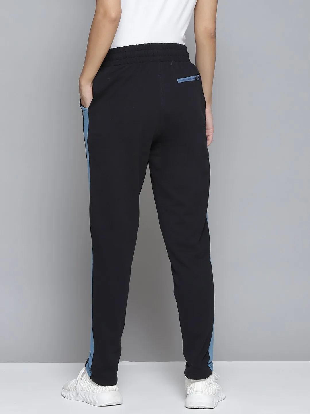 Alcis Women Black & Blue Striped Slim-Fit Track Pants Easy Movement Windproof coating