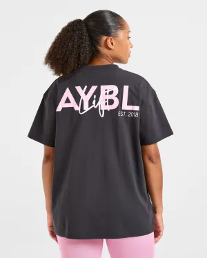 TemperatureRegulating Lining Lift Graphic Oversized T Shirt - Charcoal/Pink Chic Comfort