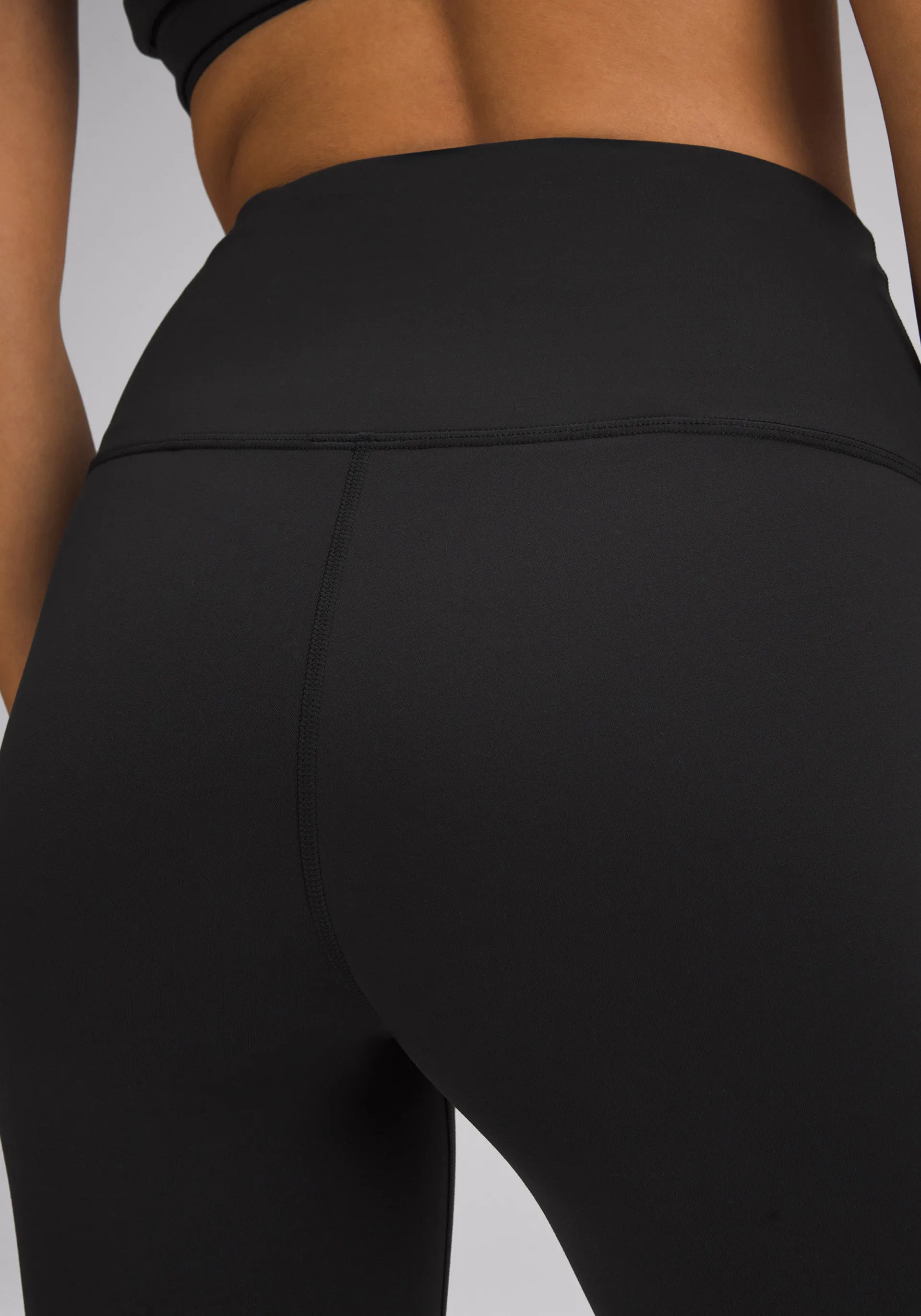 Wunder Train High-Rise Tight 25" | Hem Slit Move Fast Reflective Logo Detail