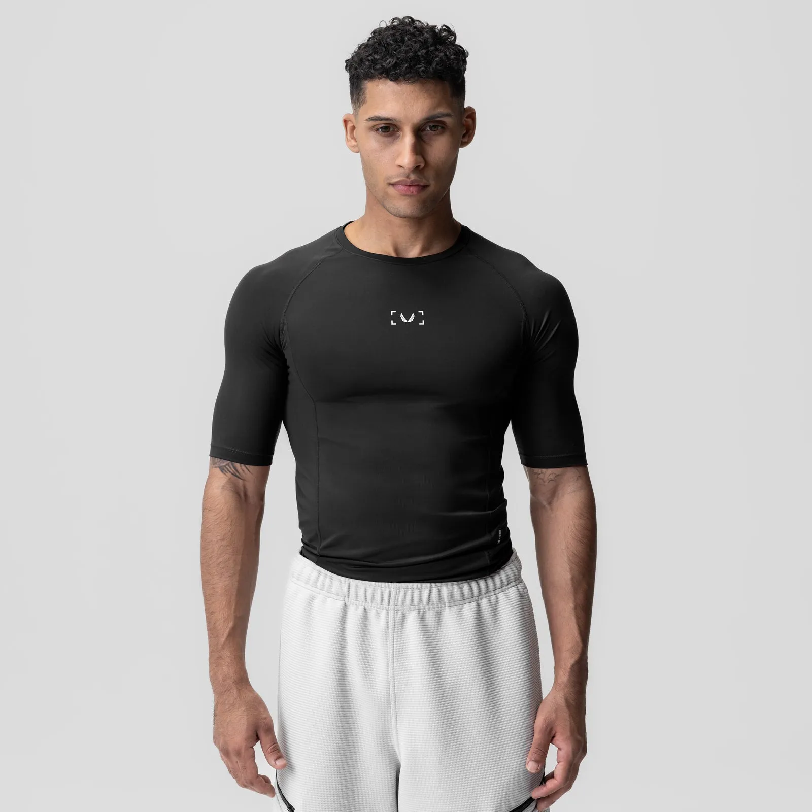 Anti Shrinkage Treatment Travel Essential 1027. WarpFlexx-Lite? Half-Sleeve Baselayer - Black