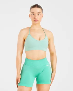Essential V Neck Strappy Sports Bra - Light Sage Seamless Closure Modern