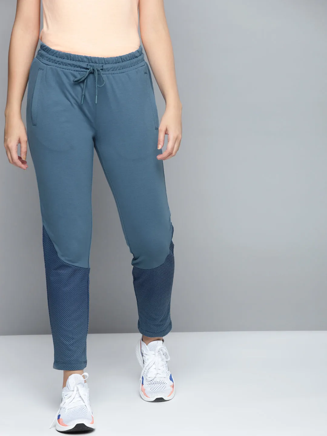 No Ride Up Design No Gap Waist Construction Alcis Women Blue Solid Slim Fit Track Pants with Printed Detail