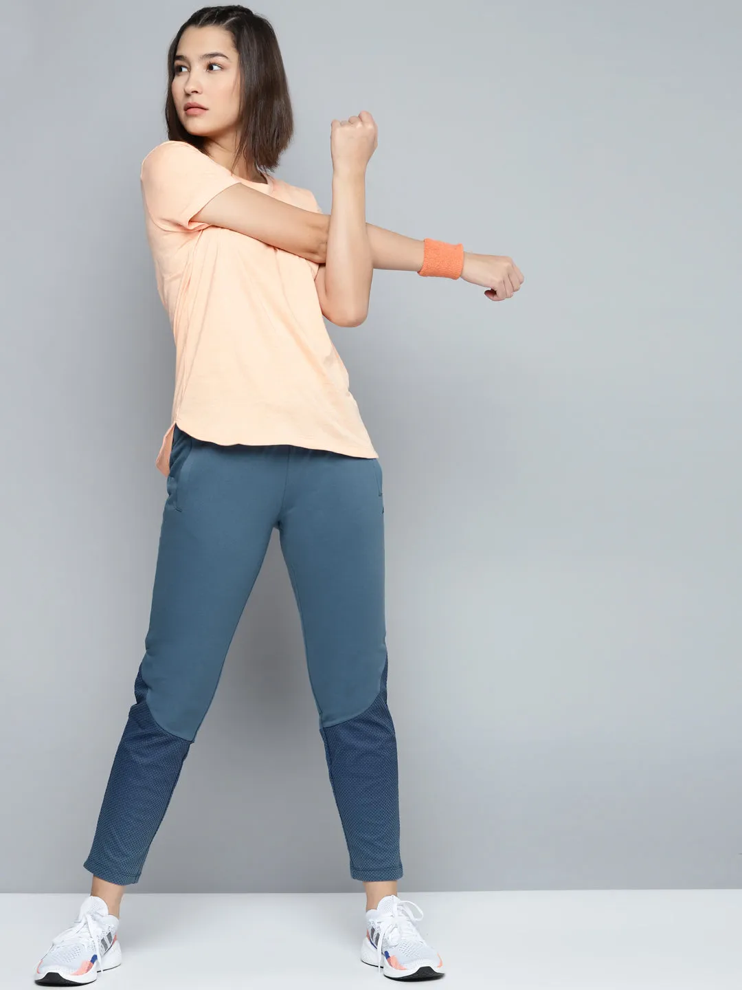 NonIrritatingStitching Relaxed Comfort Alcis Women Blue Solid Slim Fit Track Pants with Printed Detail