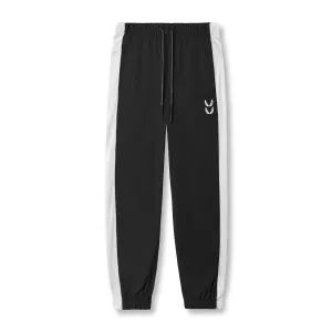 0796. Ripstop Oversized Track Pant - Black Effortless Style