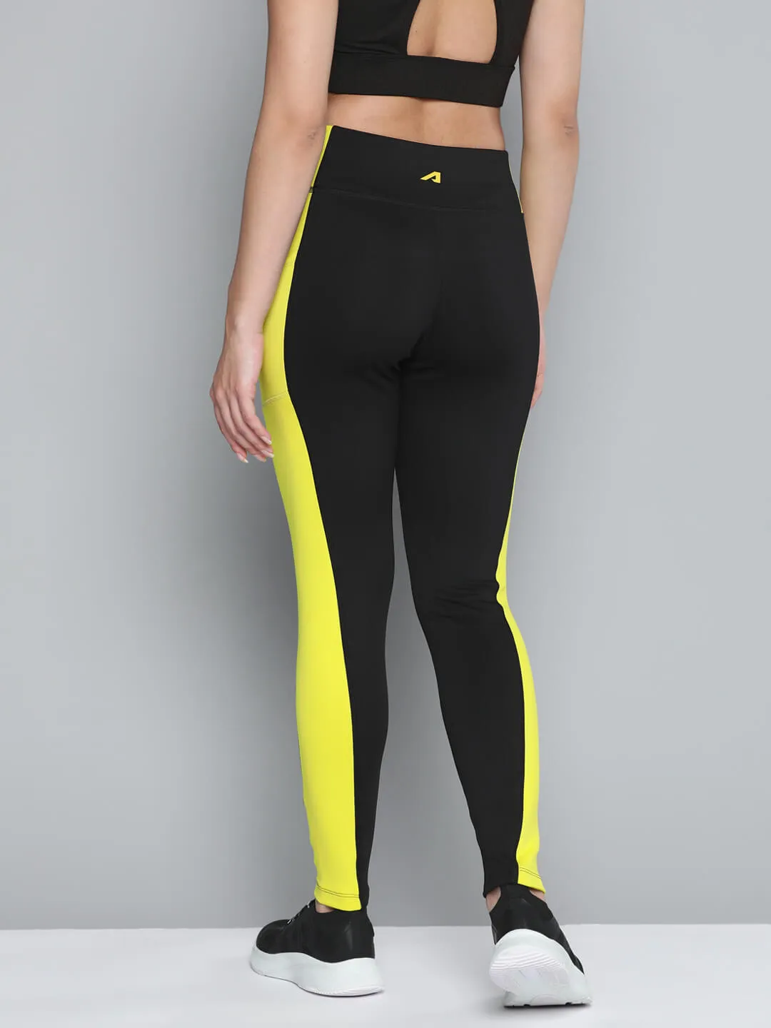 Alcis Women Black Yellow Colorblocked Sports Tights Breathable mesh Four Way Daily Routine