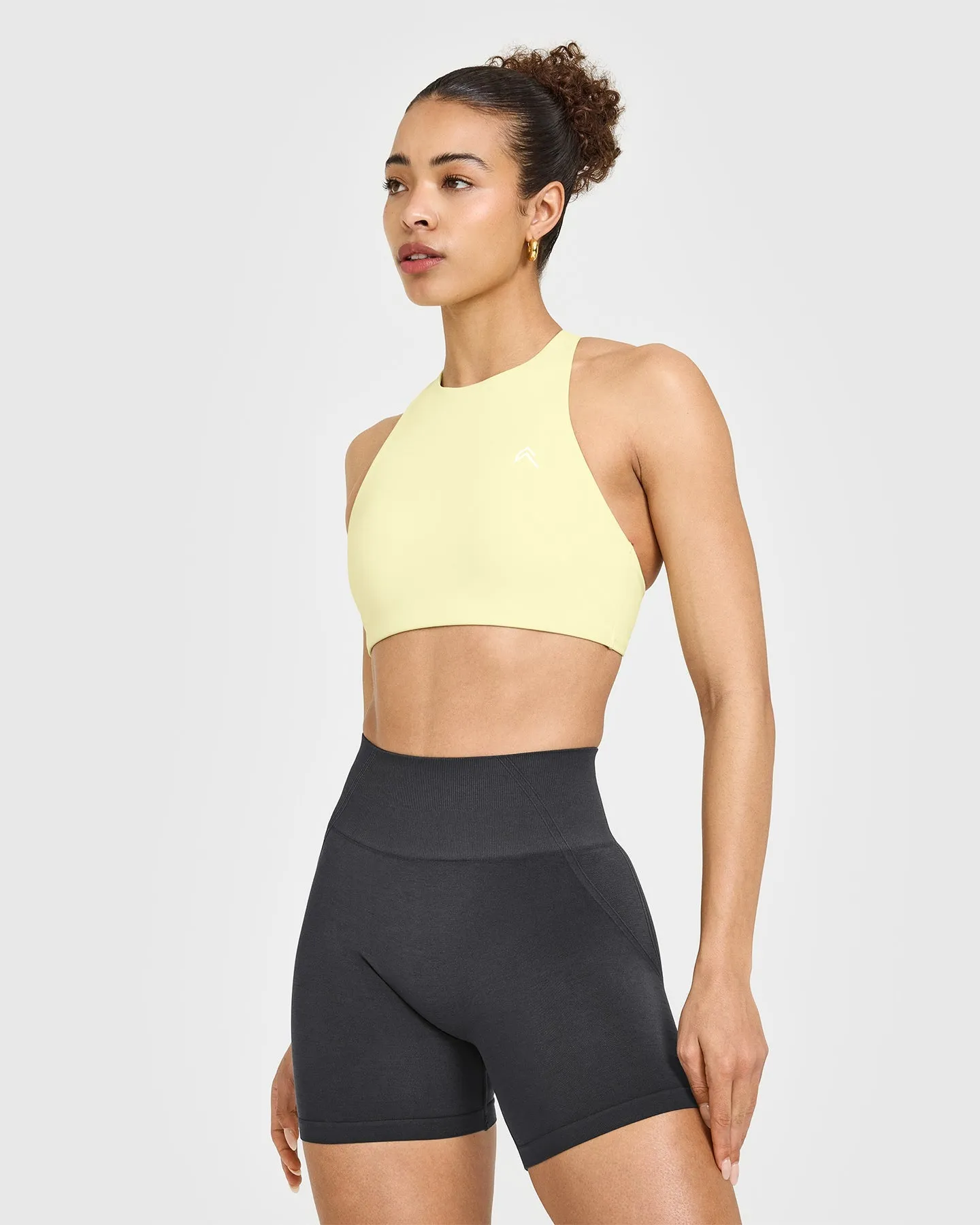 EasyLift? High Neck Sports Bra | Pastel Yellow Geometric Shapes Reinforced Stress Points Cost-effective