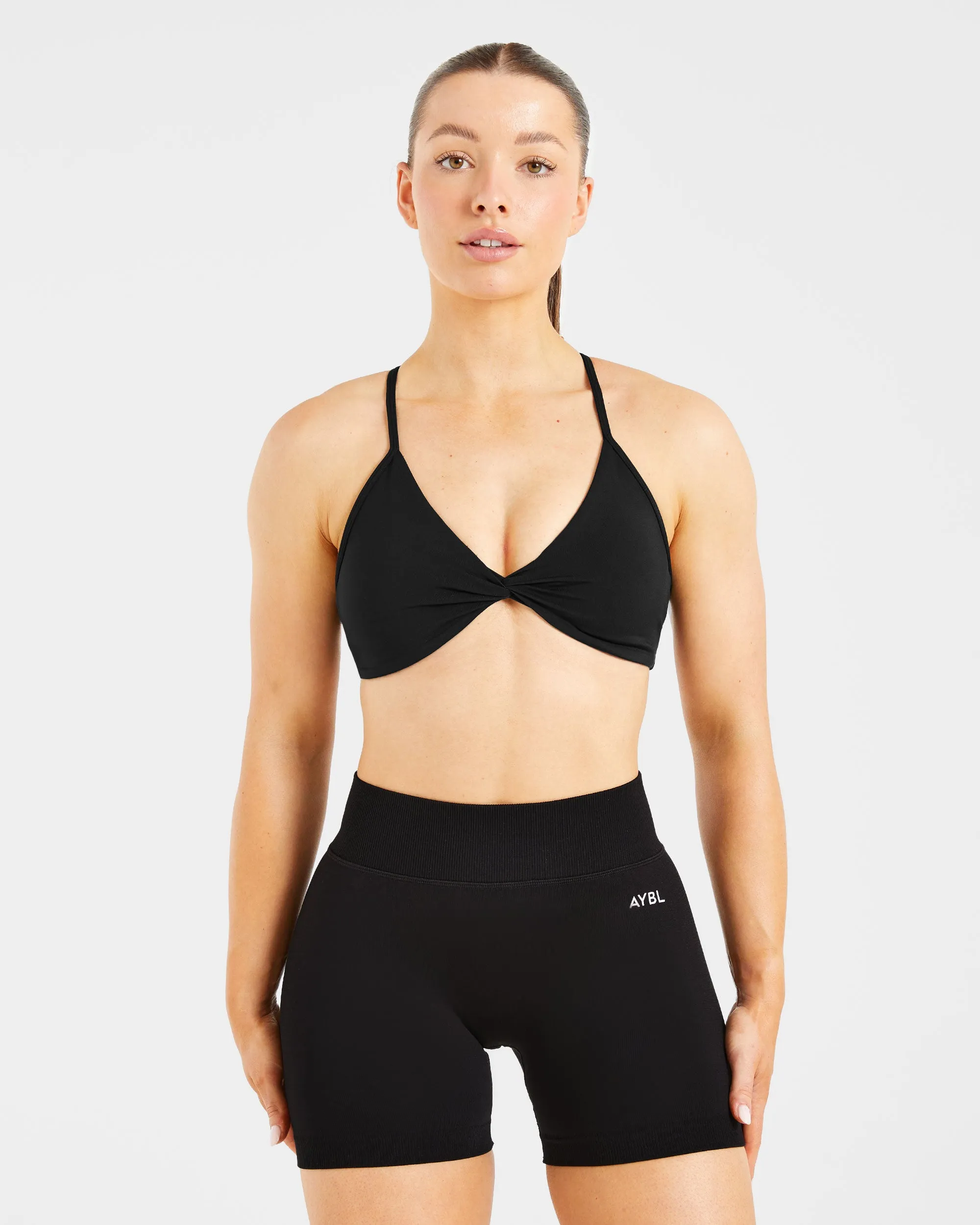 Essential Twist Crossback Sports Bra - Black Modern fitness gear