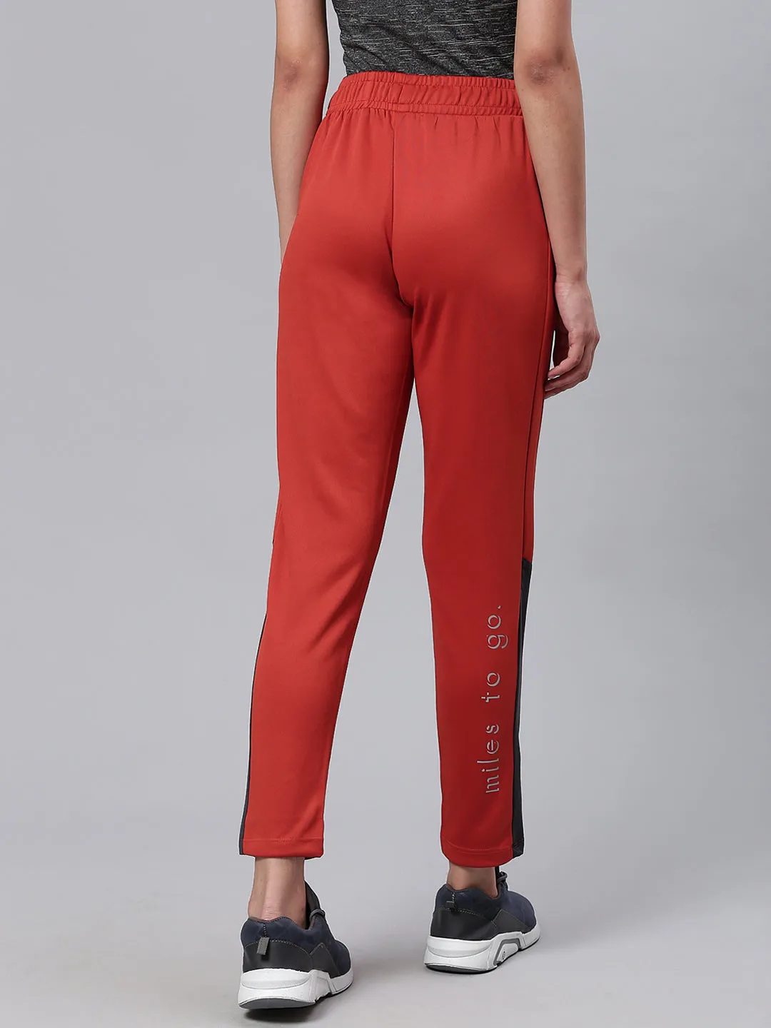Tailored Fit Alcis Women Rust Orange Slim Fit Solid Cropped Running Track Pants