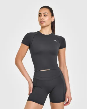 Total Flex Go To Seamless Fitted Mid Top | Coal SmoothInnerLining