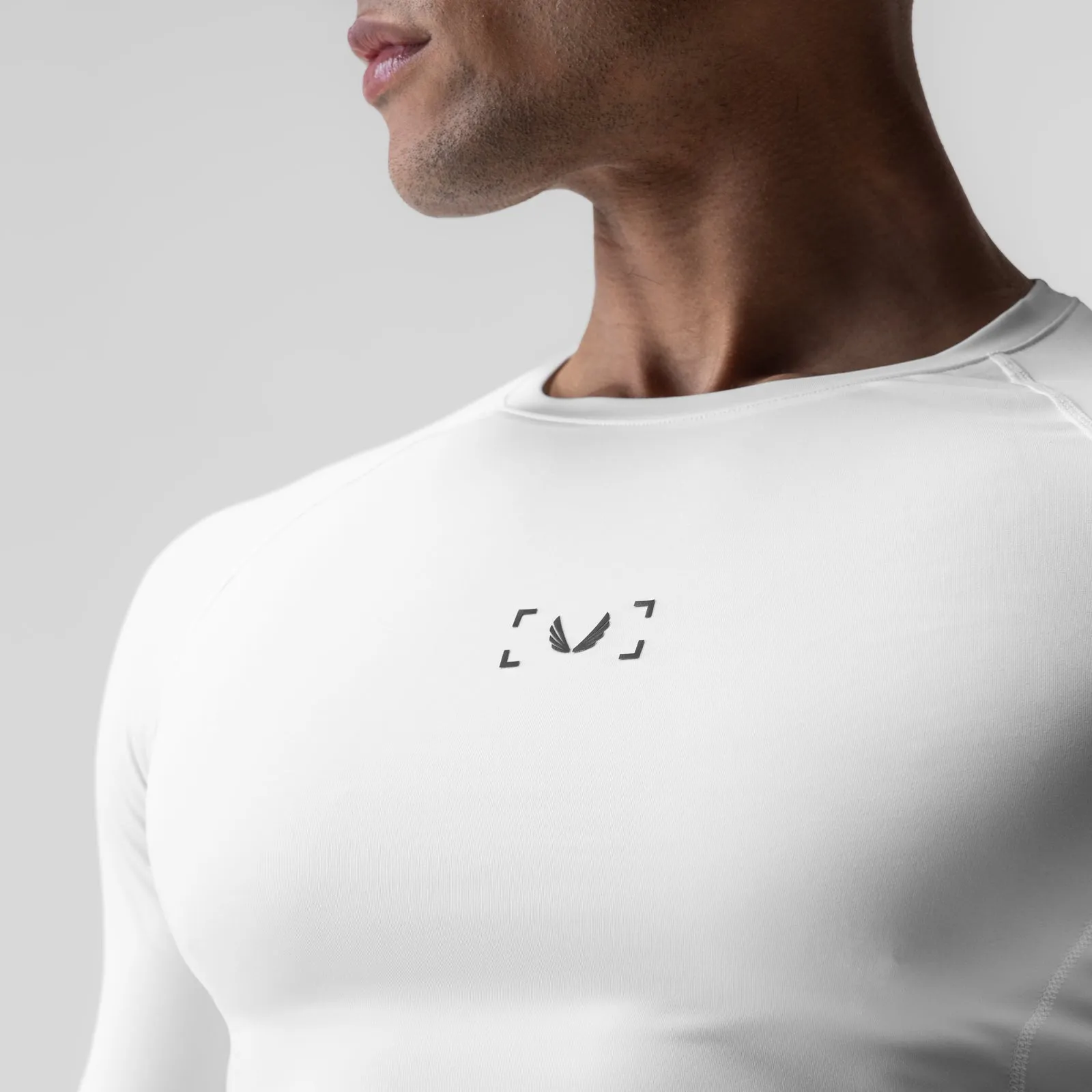 1027. WarpFlexx-Lite? Half-Sleeve Baselayer - White Versatile Layering Piece