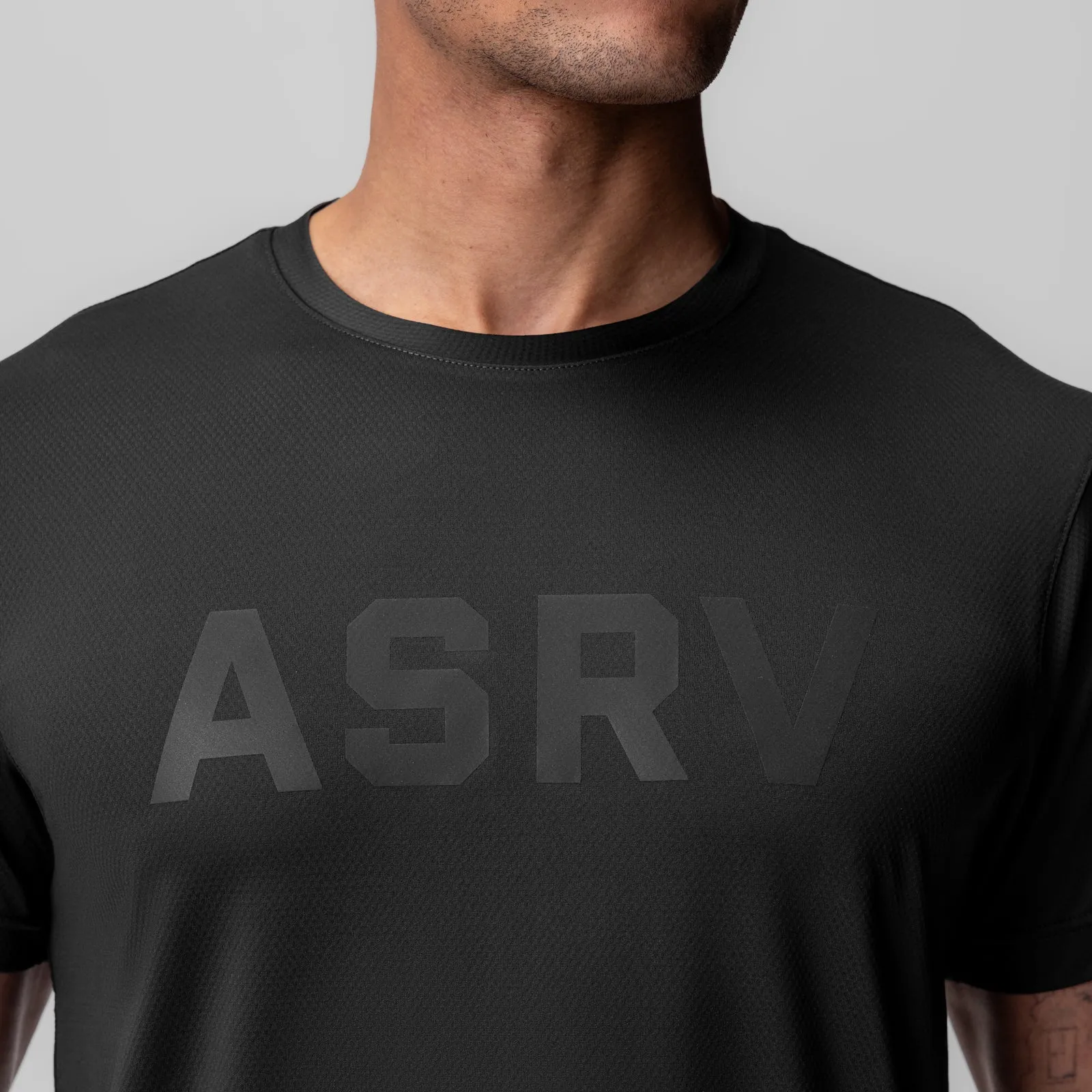 1015. AeroSilver? Essential Tee - Black "ASRV" Seam Free Back