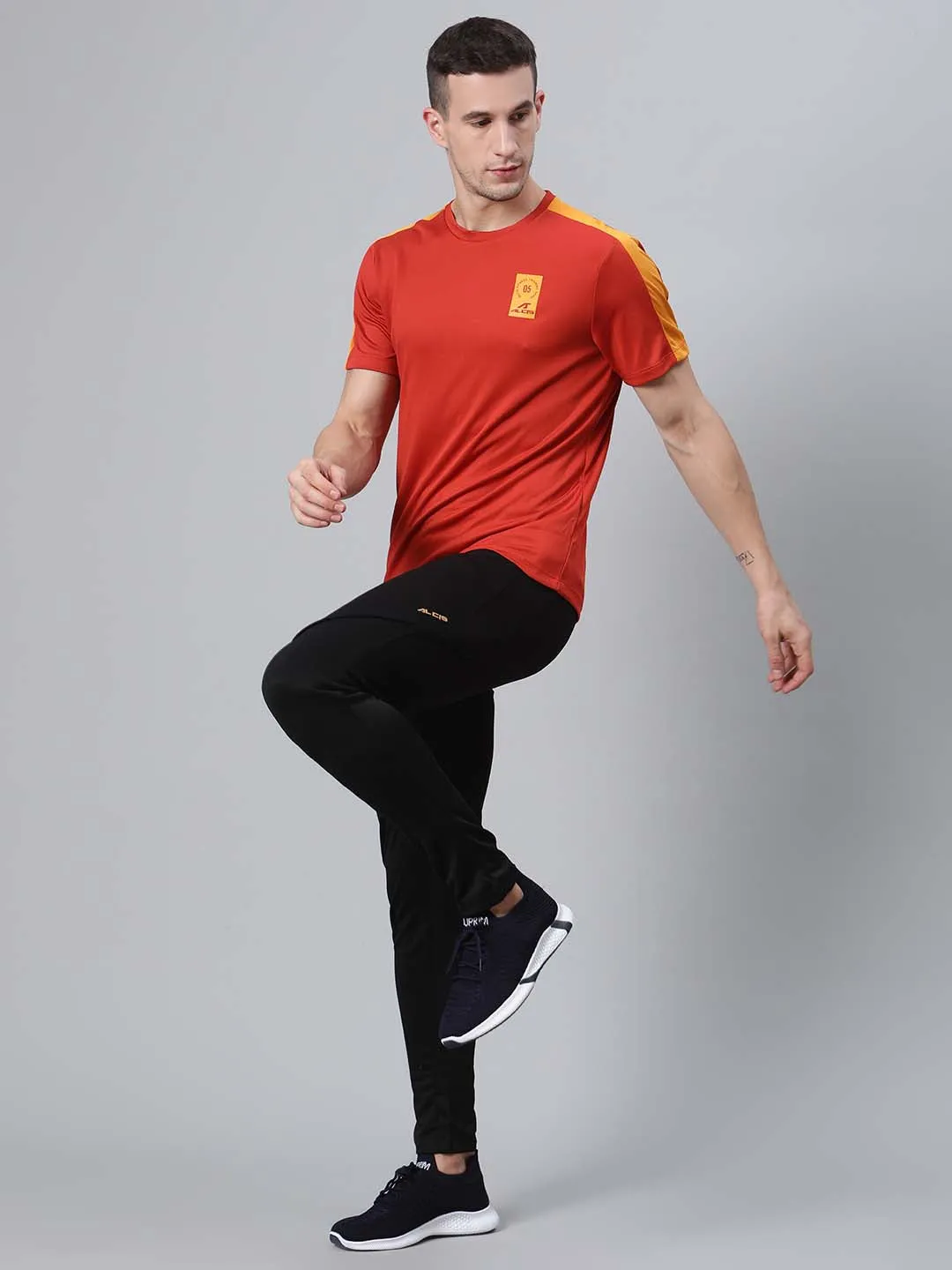 Alcis Men Rust Red Solid Round Neck Training T-shirt Planet Glow