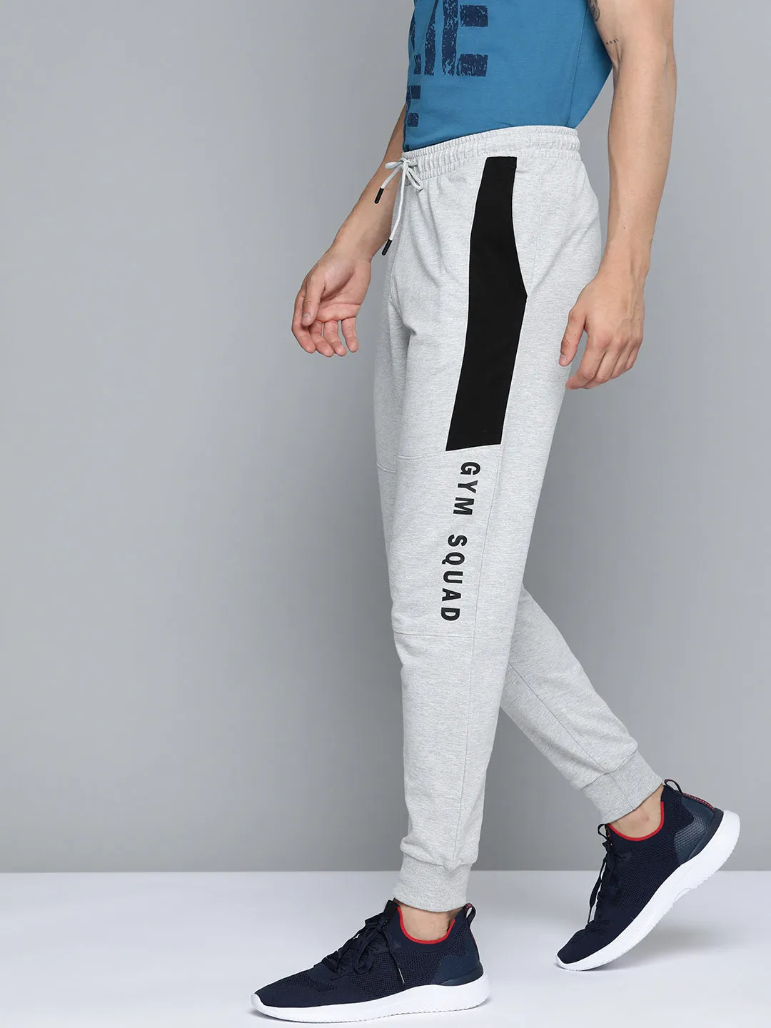 LowProfileTopstitching Alcis Men Grey Melange Typography Printed Track Pants