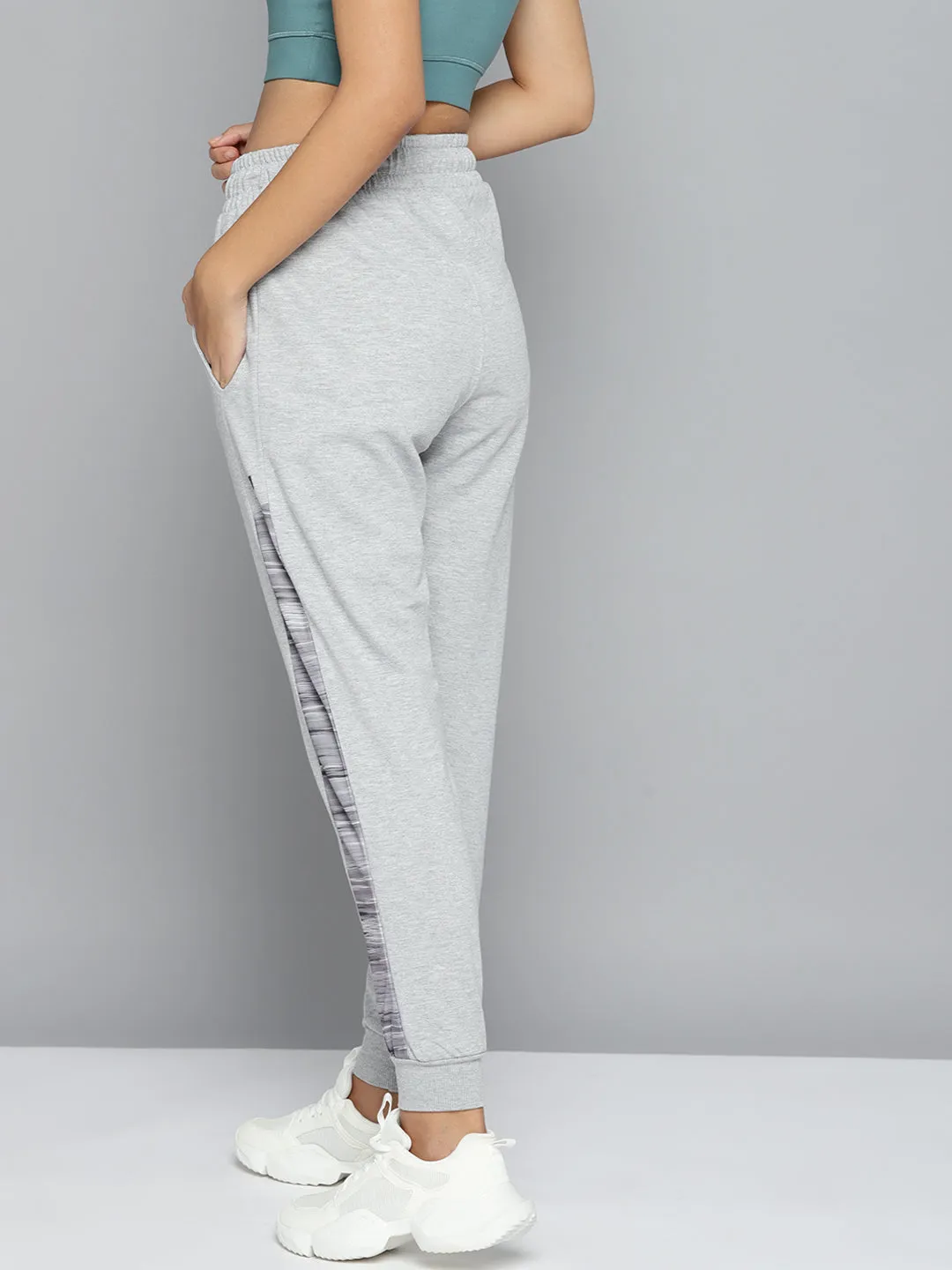 Alcis Women Grey Melange Solid Slim-Fit Training Joggers with Side Taping Smooth Finish Stretch Comfort