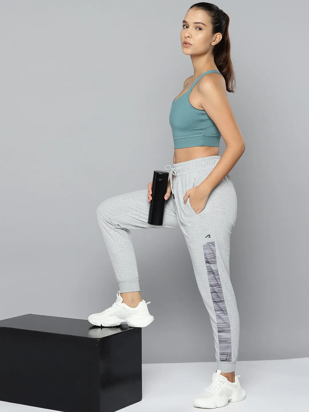 BreathableMeshLining Fade Resistant Alcis Women Grey Melange Solid Slim-Fit Training Joggers with Side Taping