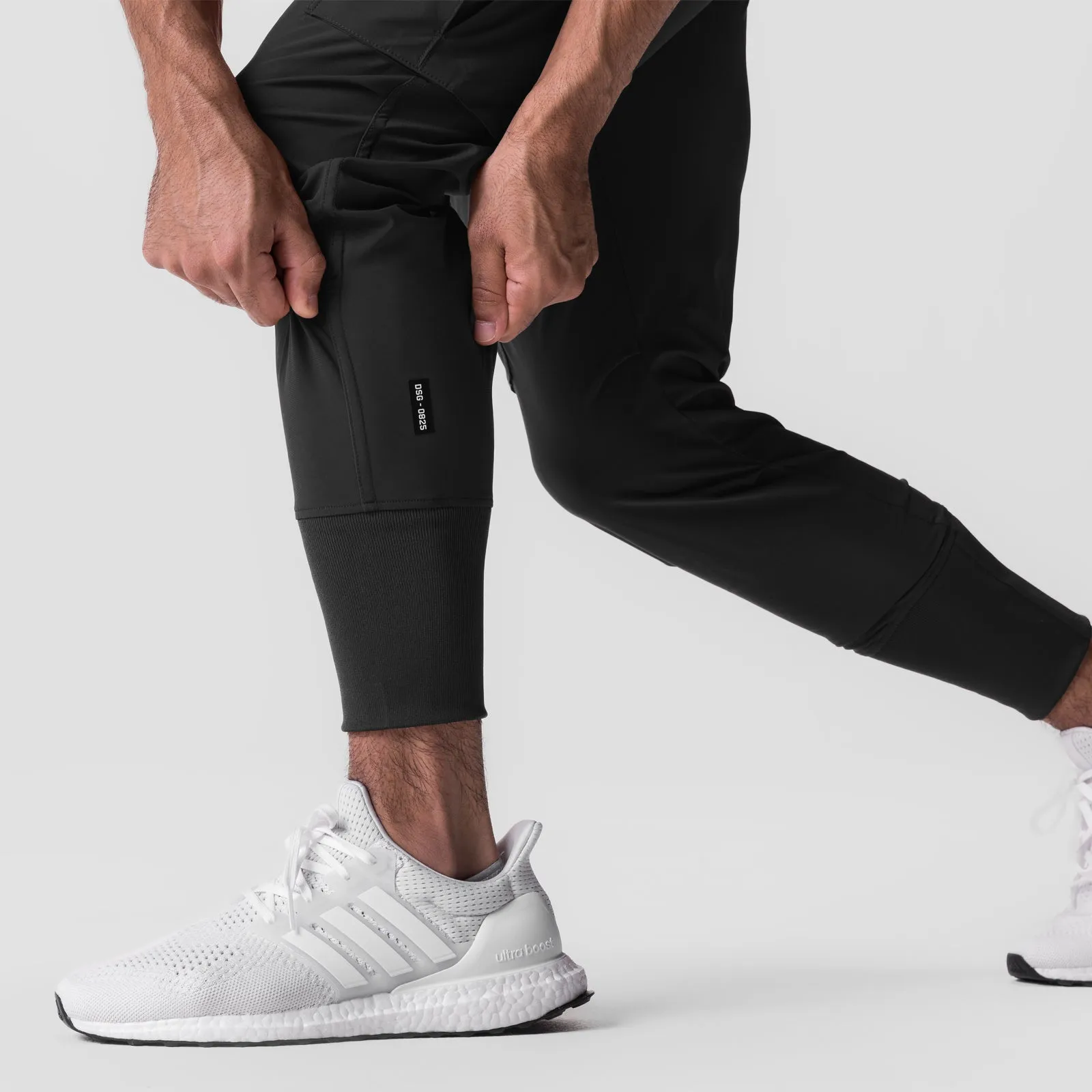 Fade Resistant Dye 0825. Tetra-Lite? Cargo High Rib Jogger - Black "White Wings"
