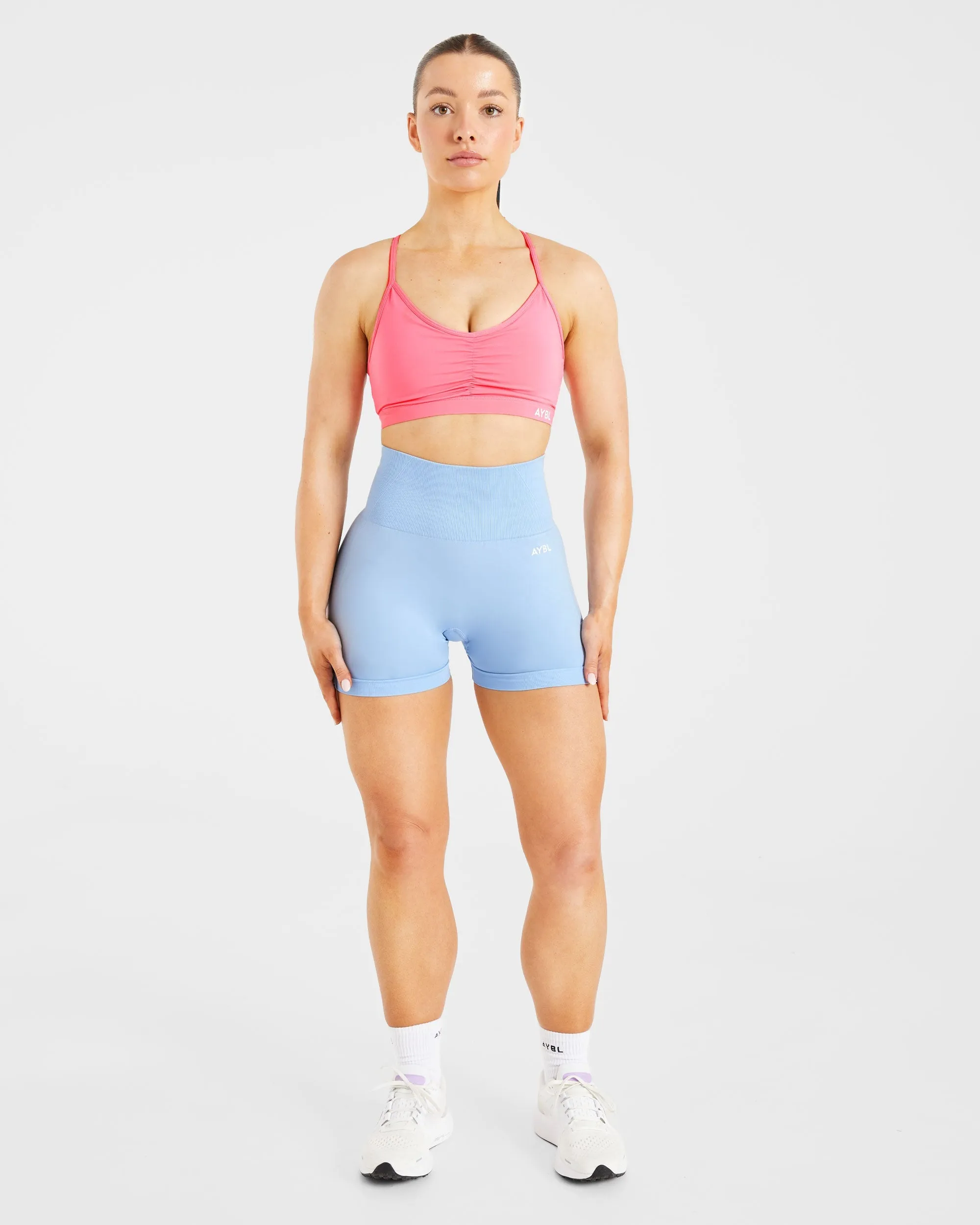 Essential Ruched Sports Bra - Coral Pink coordinate with other items