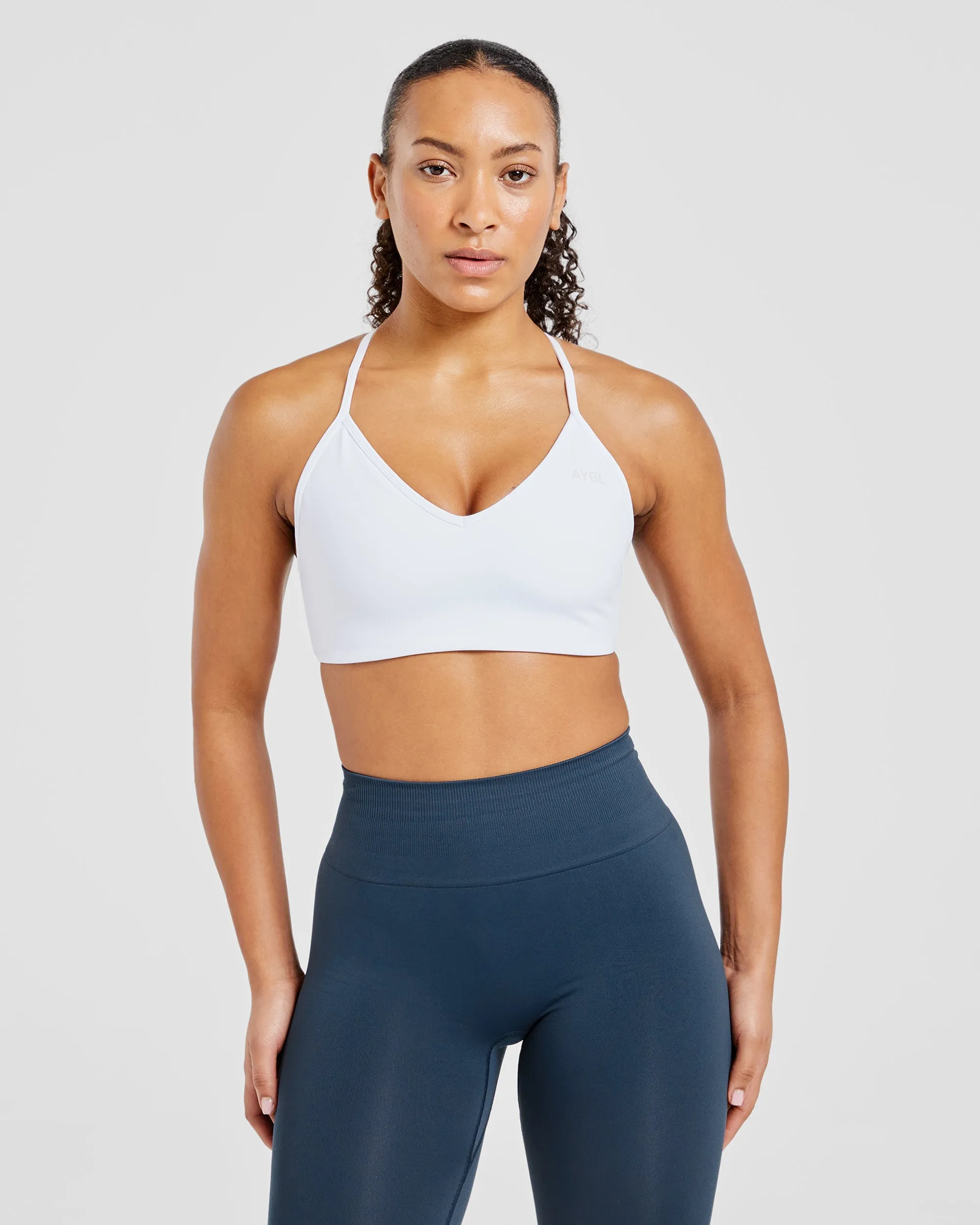 Supportive seams Anti-pilling seams Essential Crossback Sports Bra - White