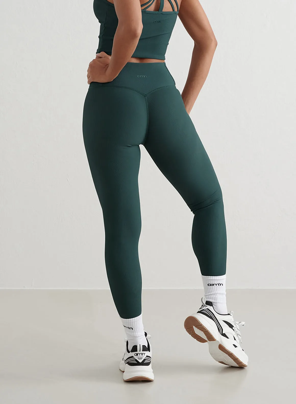 Deep Emerald Ribbed Performance Tights Seamless Pockets Body Shaping Travel Enthusiast