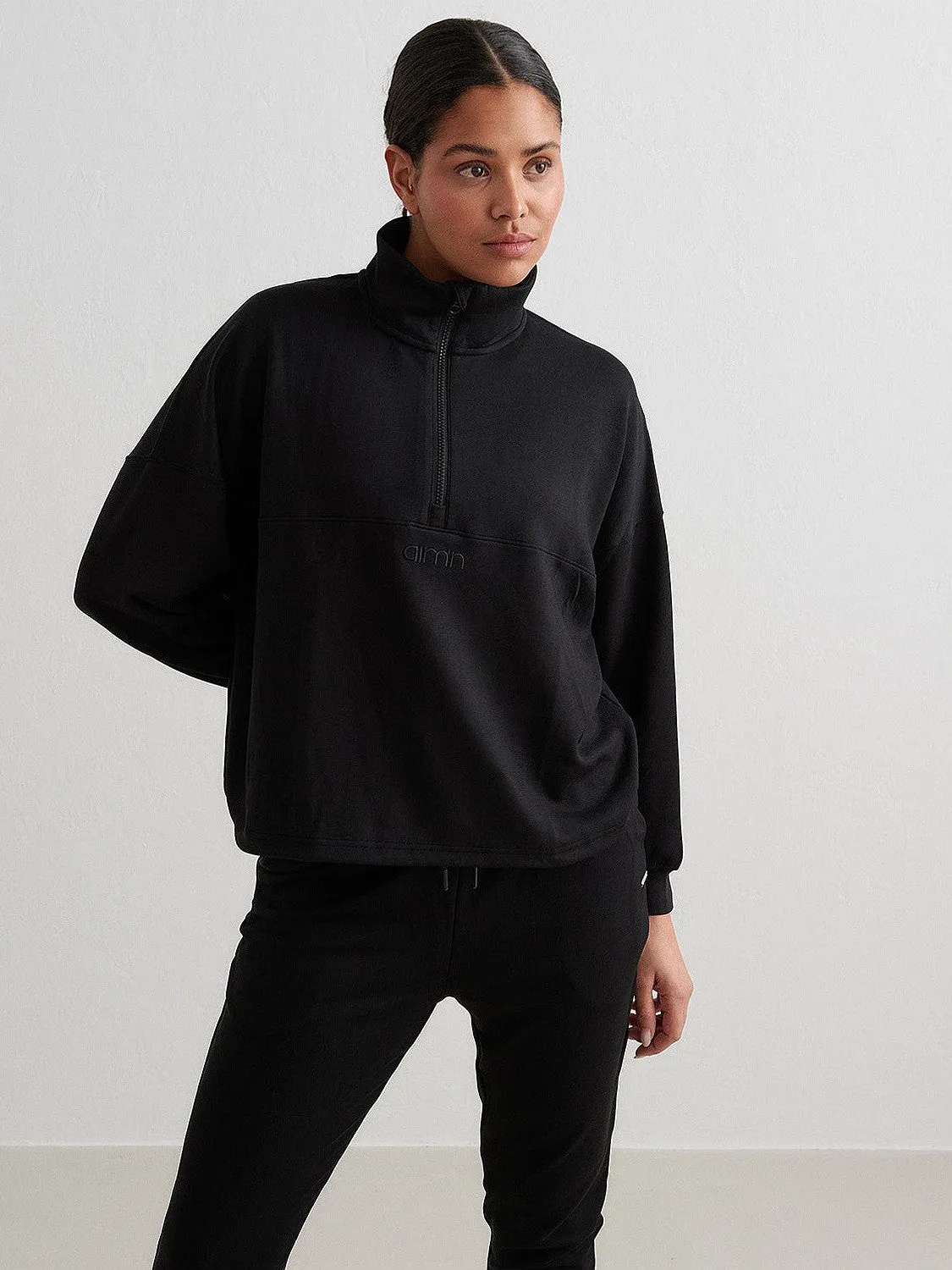 Black Comfy Half Zip Urban Energy short sleeves