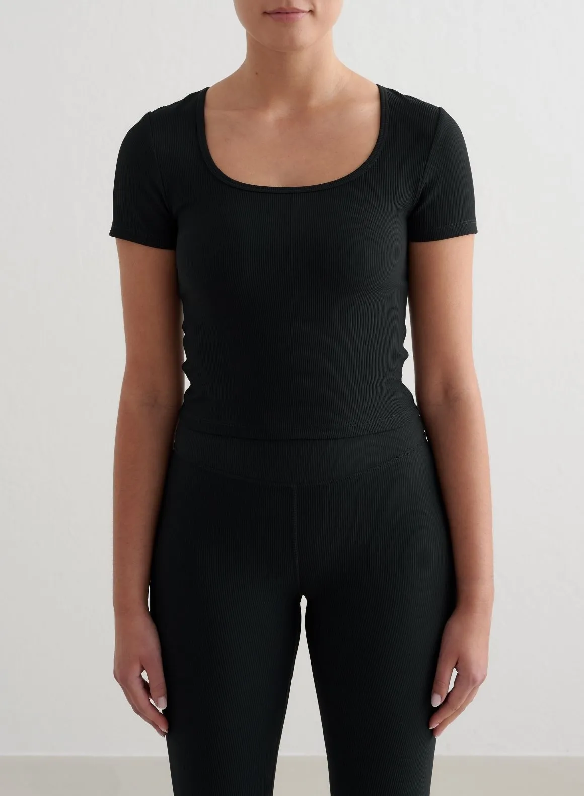 Non Restrictive Silhouette Wicking Interlock Knit Black Ribbed Performance Short Sleeve