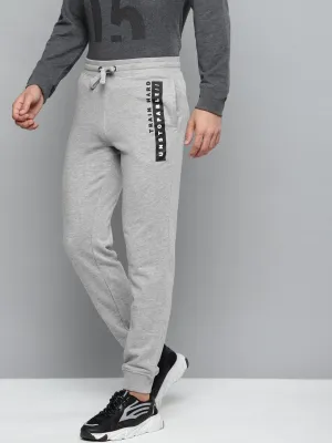 breath easy Functional Style Alcis Men Grey Melange Solid Slim Fit Joggers with Printed Detail
