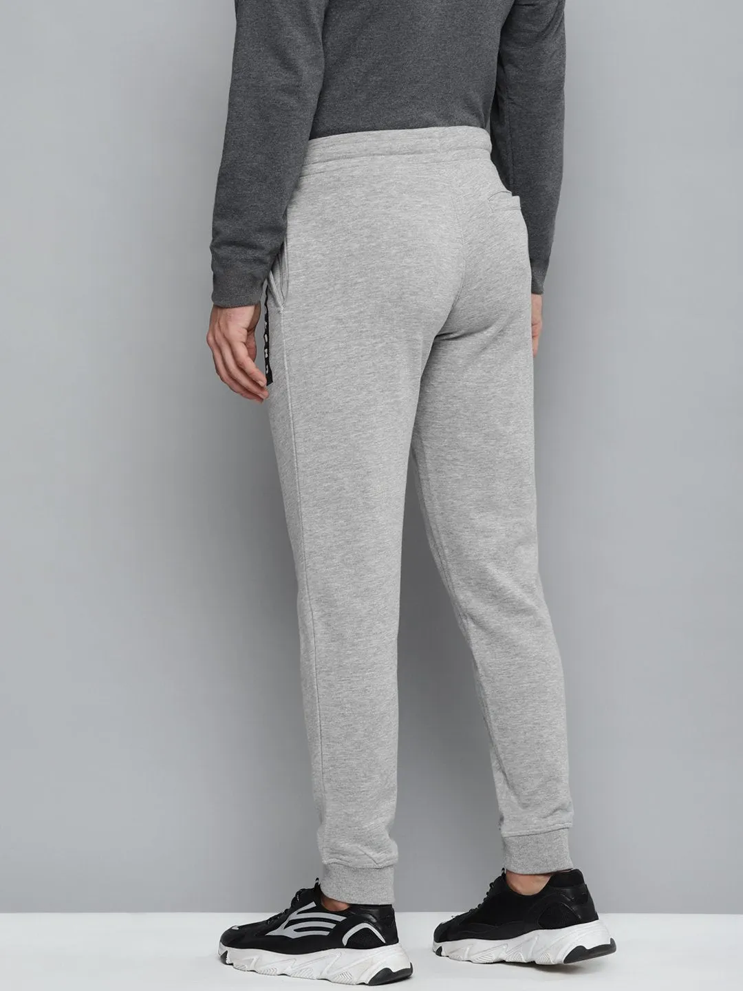 Alcis Men Grey Melange Solid Slim Fit Joggers with Printed Detail StretchMaterial Quick Access Pockets