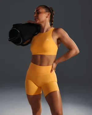 Adjustable band EasyLift? High Neck Sports Bra | Powdered Orange Shape retention seams Thin straps seams