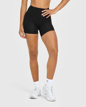 Timeless High Waisted Shorts with White Logo | Black Gusseted Crotch media industry