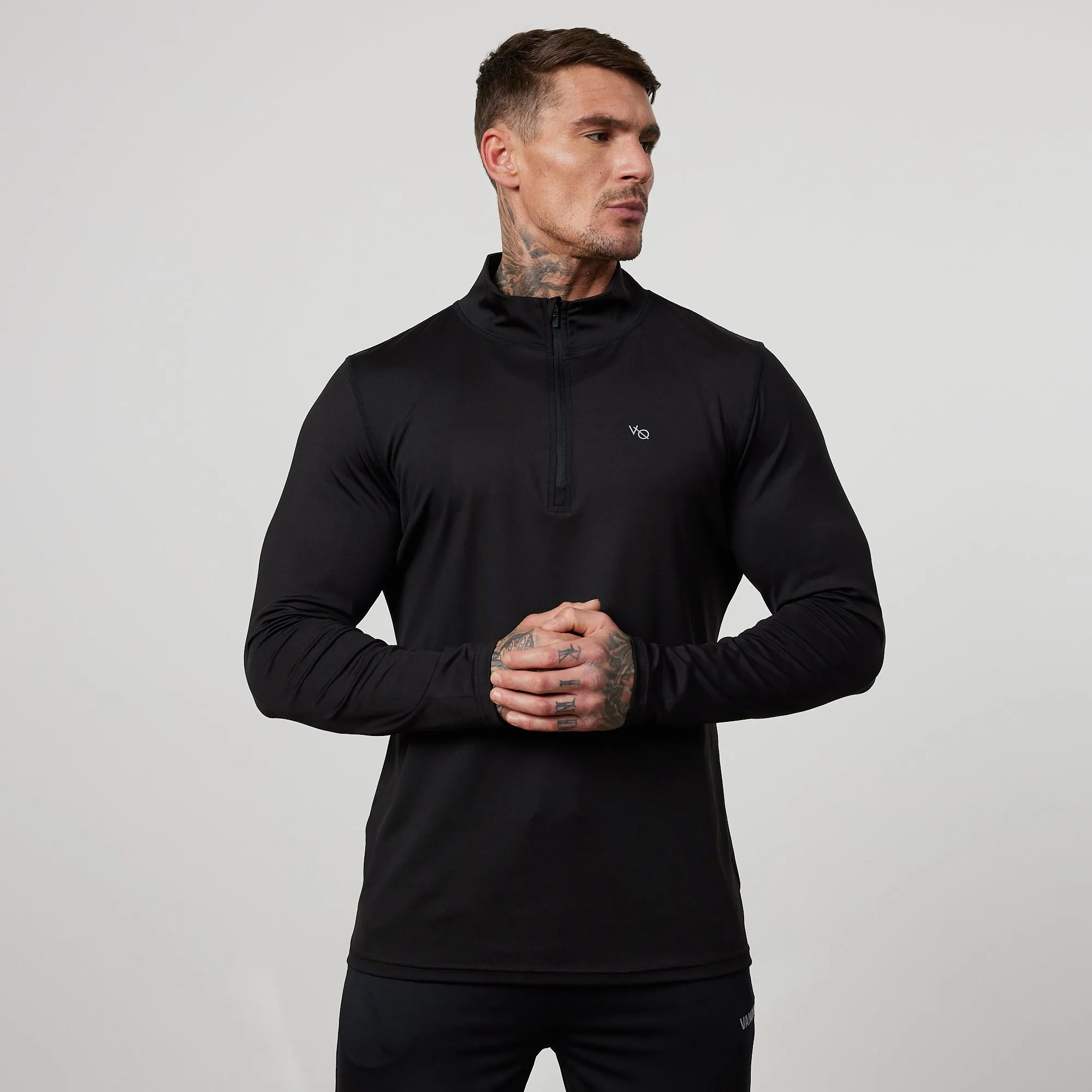 Tulle accents High Durability Fabric Vanquish Essential Black Performance 1/4 Zip Top