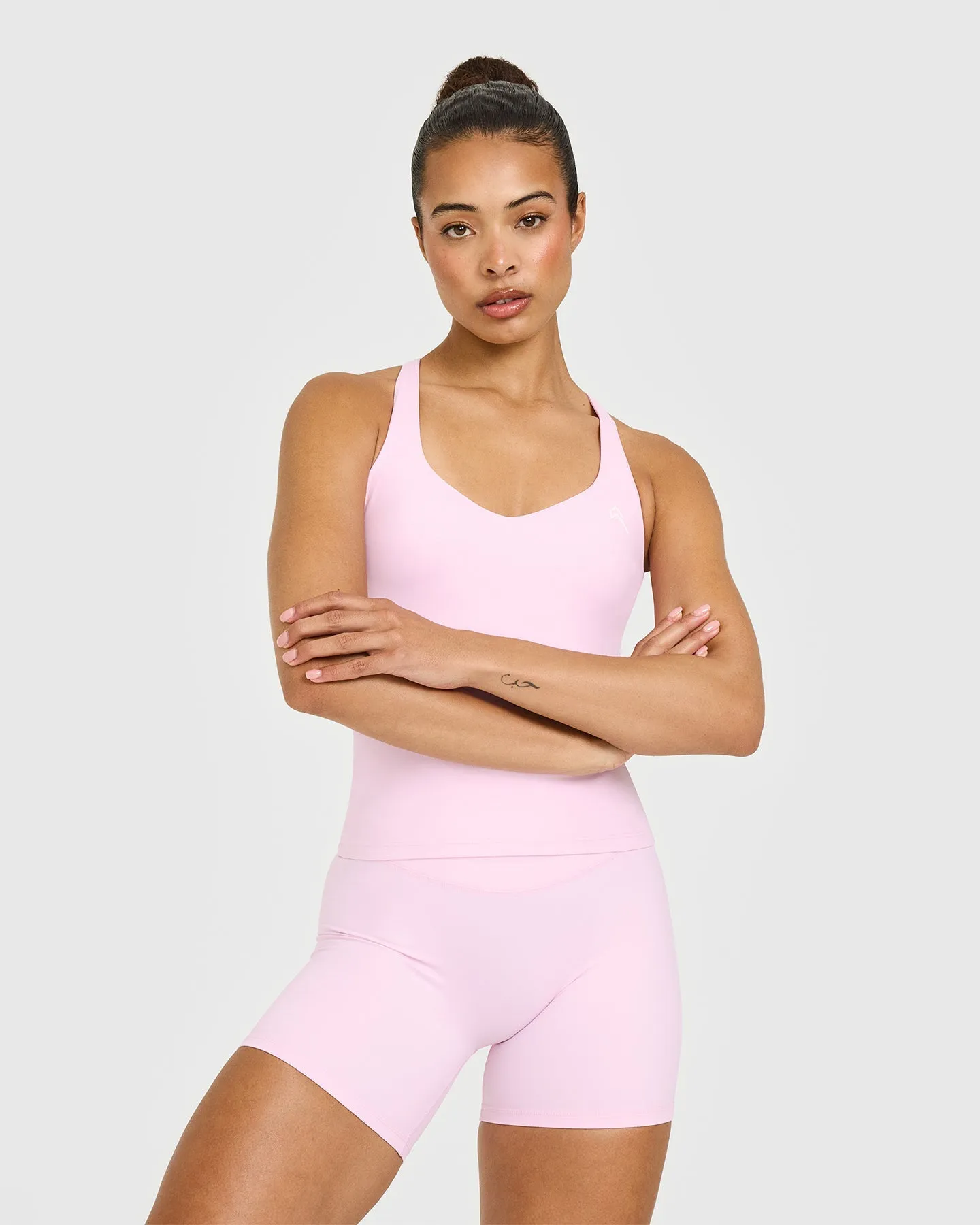 Unified V Neck Cross Back Vest | Chalk Pink Multi Pocket Configuration Yarn Dyed Pattern