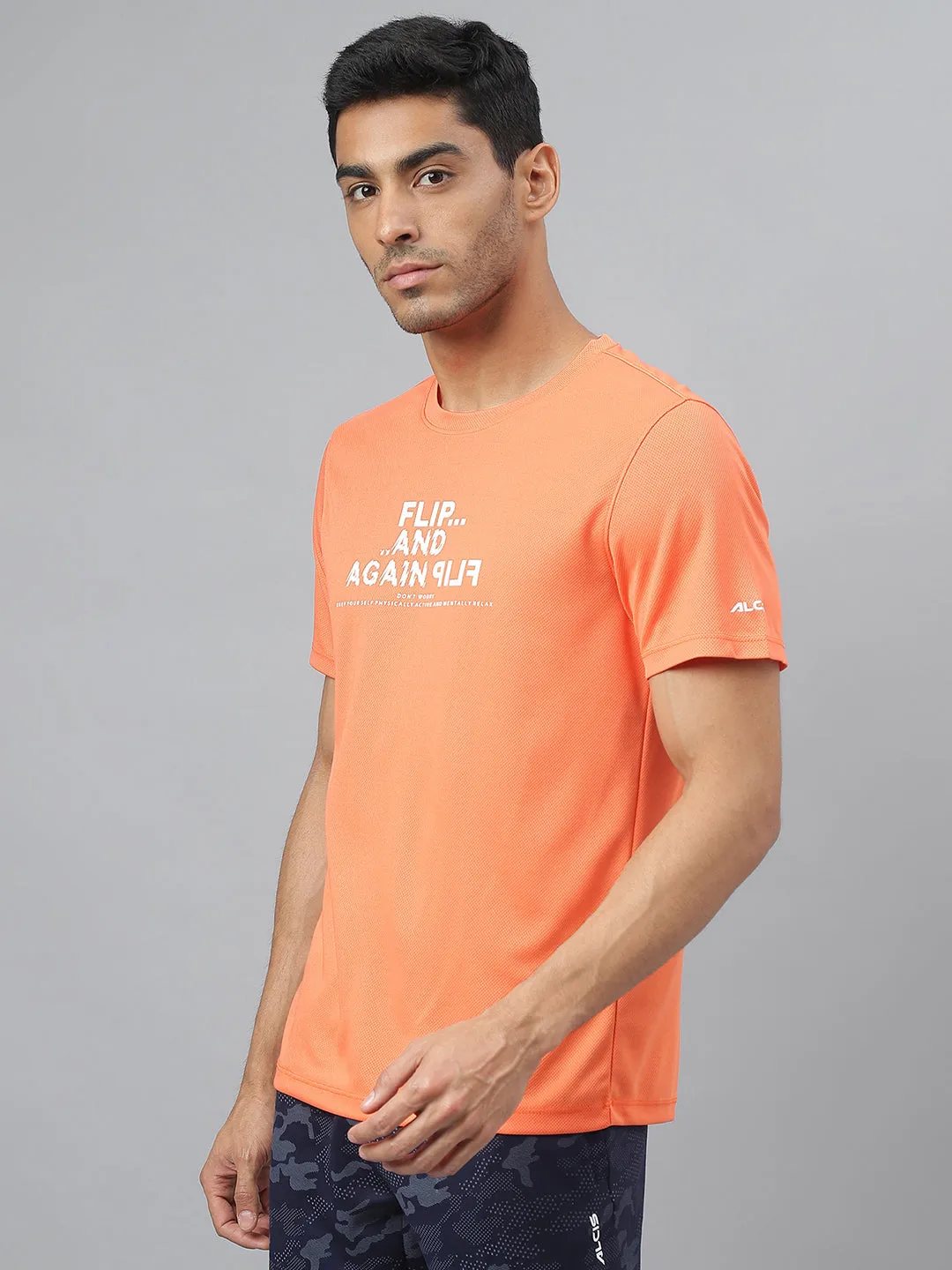 Alcis Men Printed Orange Anti-Static Slim-Fit Round Neck Training T-Shirt TearResistant