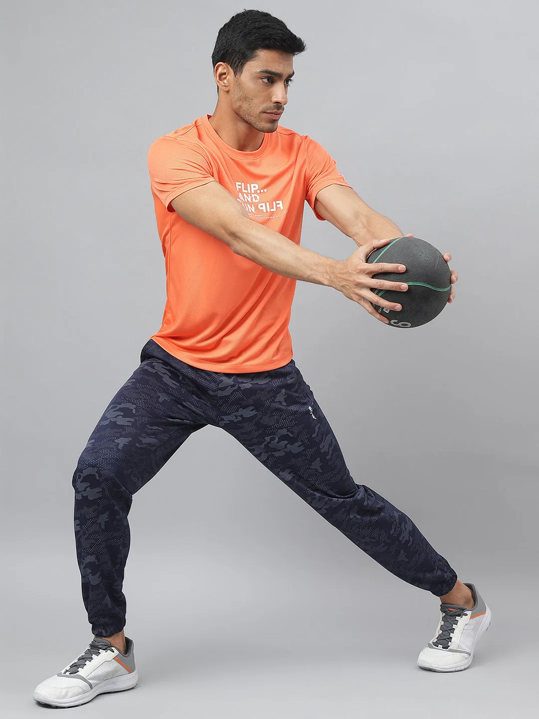 Alcis Men Printed Orange Anti-Static Slim-Fit Round Neck Training T-Shirt NonSlip Grips