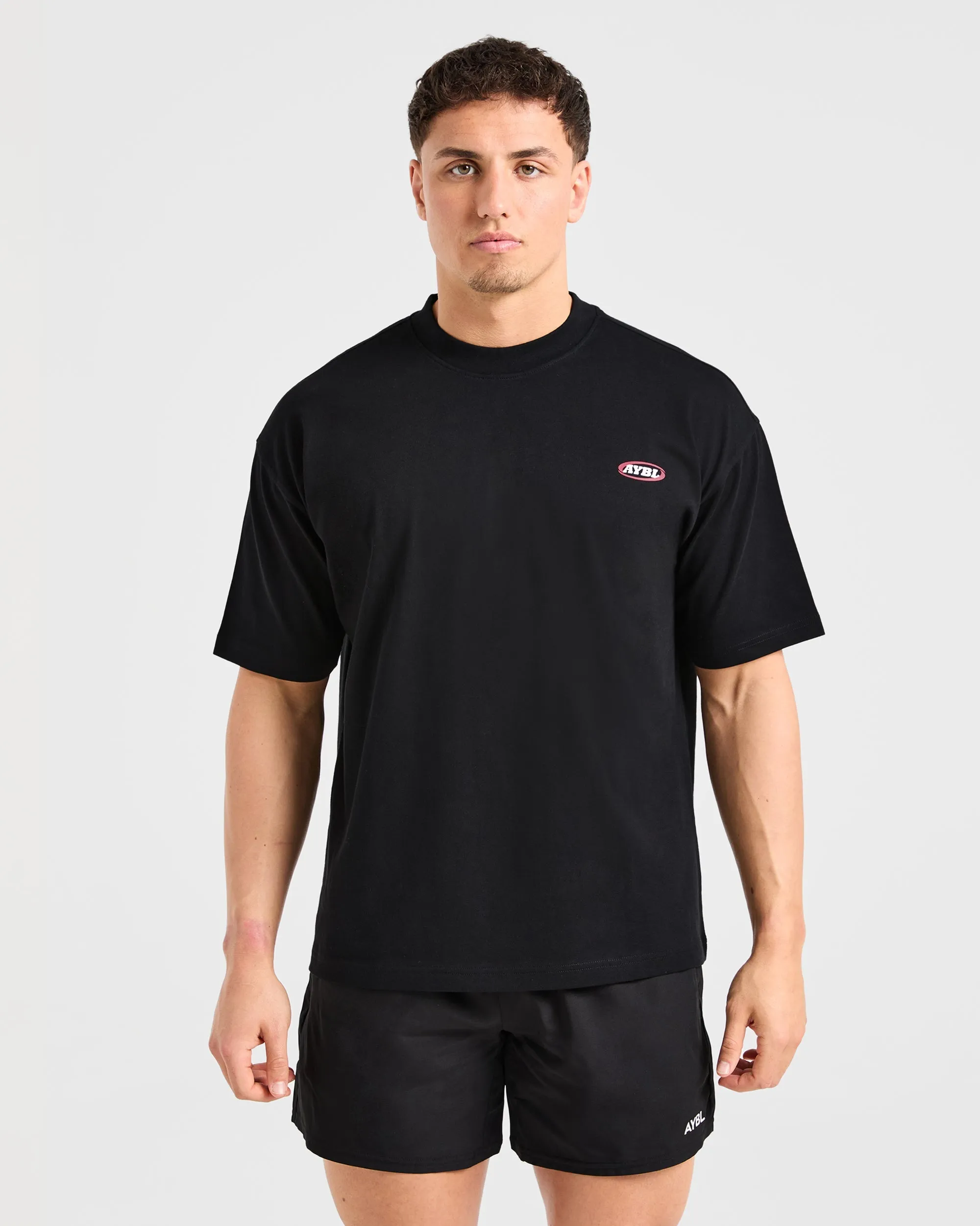 Streetwear Reversible Design Concept Athletics Script Oversized T Shirt - Black