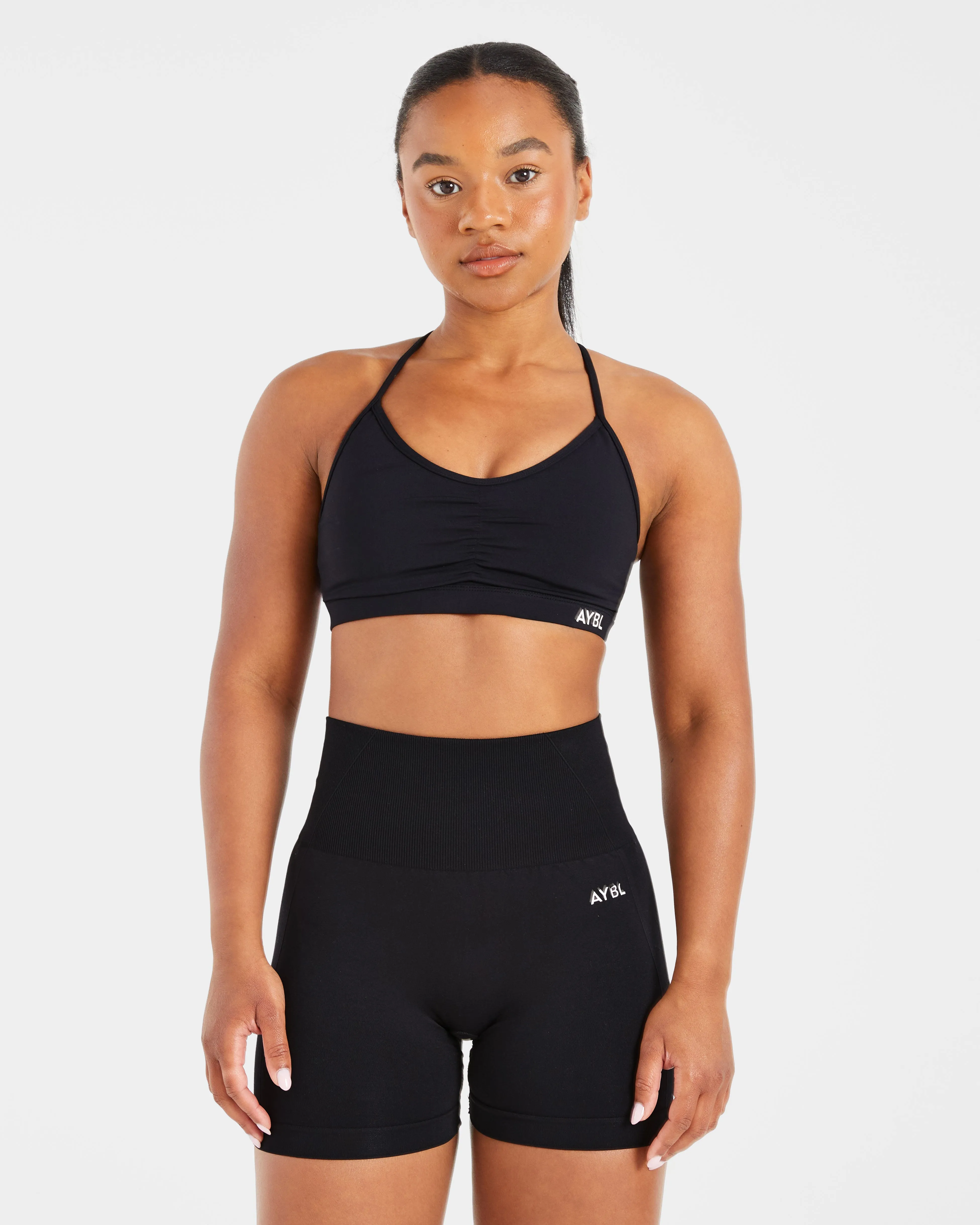 Essential Ruched Sports Bra - Black Topstitching seams Smooth Fabric