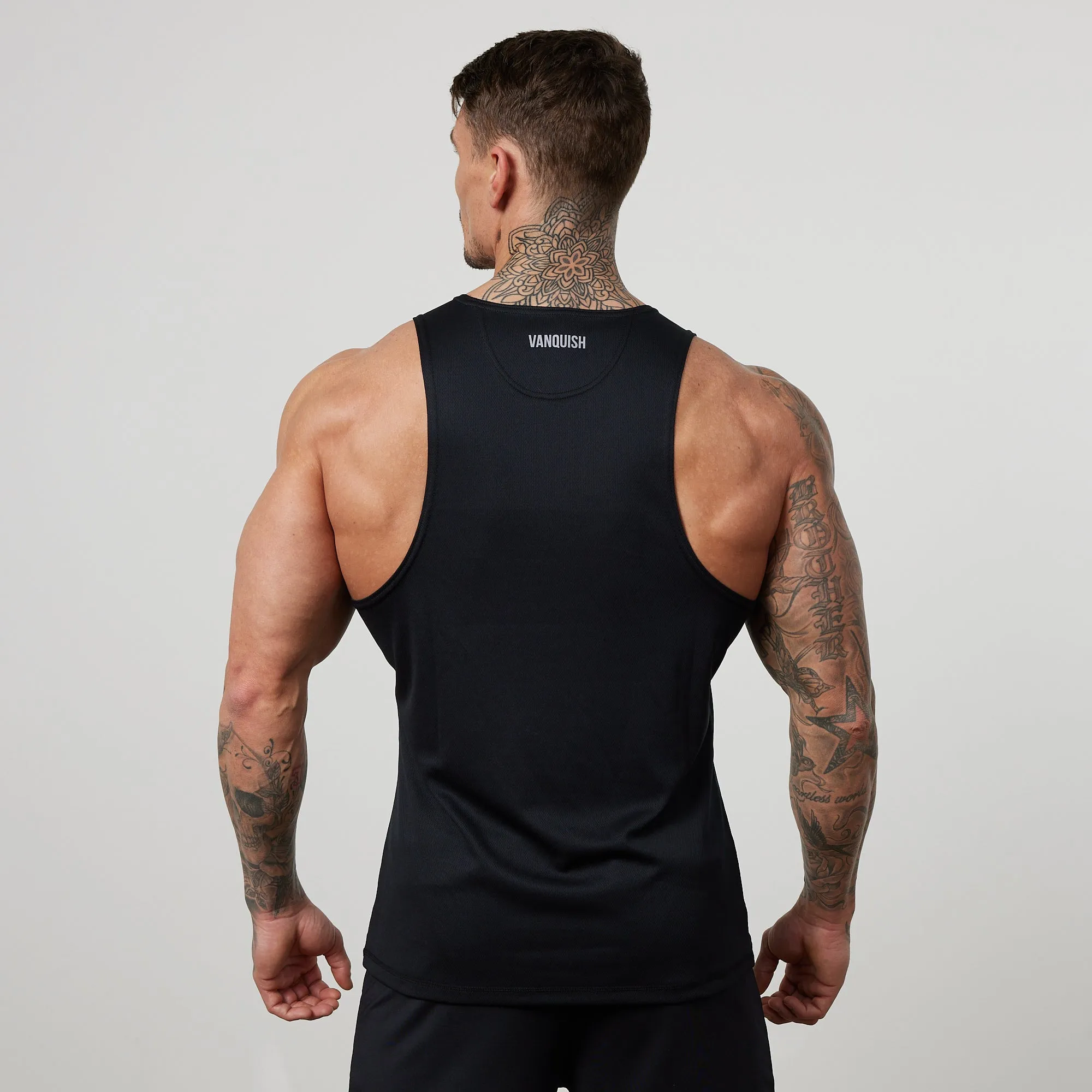 Friction Reducing Lining advertising campaign Vanquish Essential Black Performance Tank Top