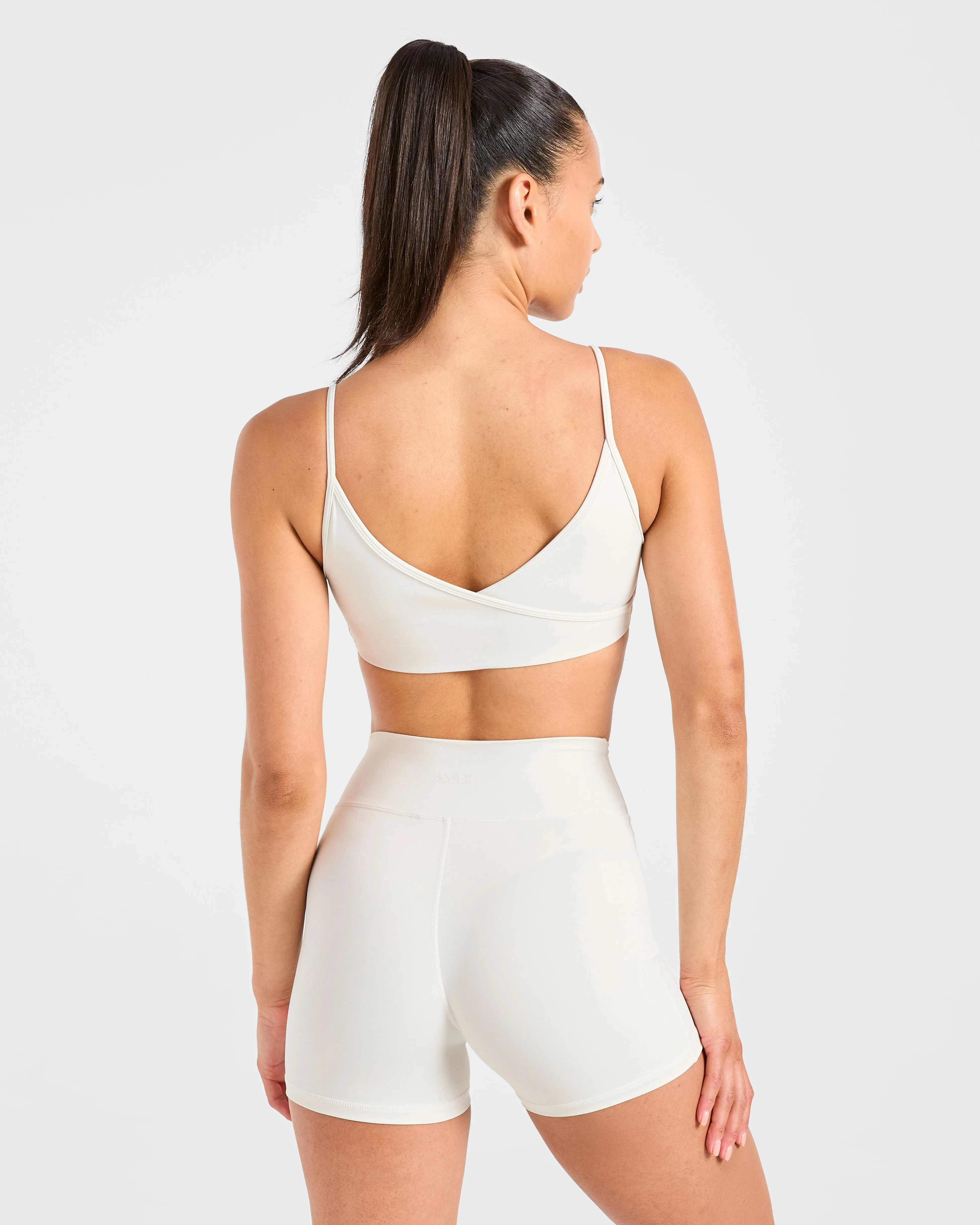 Bounce Reduction Technology adjustable material Sculpt Wrap Sports Bra - Tofu