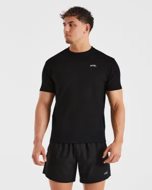 Essential T Shirt - Black Flatlock stitching Fun and Playful