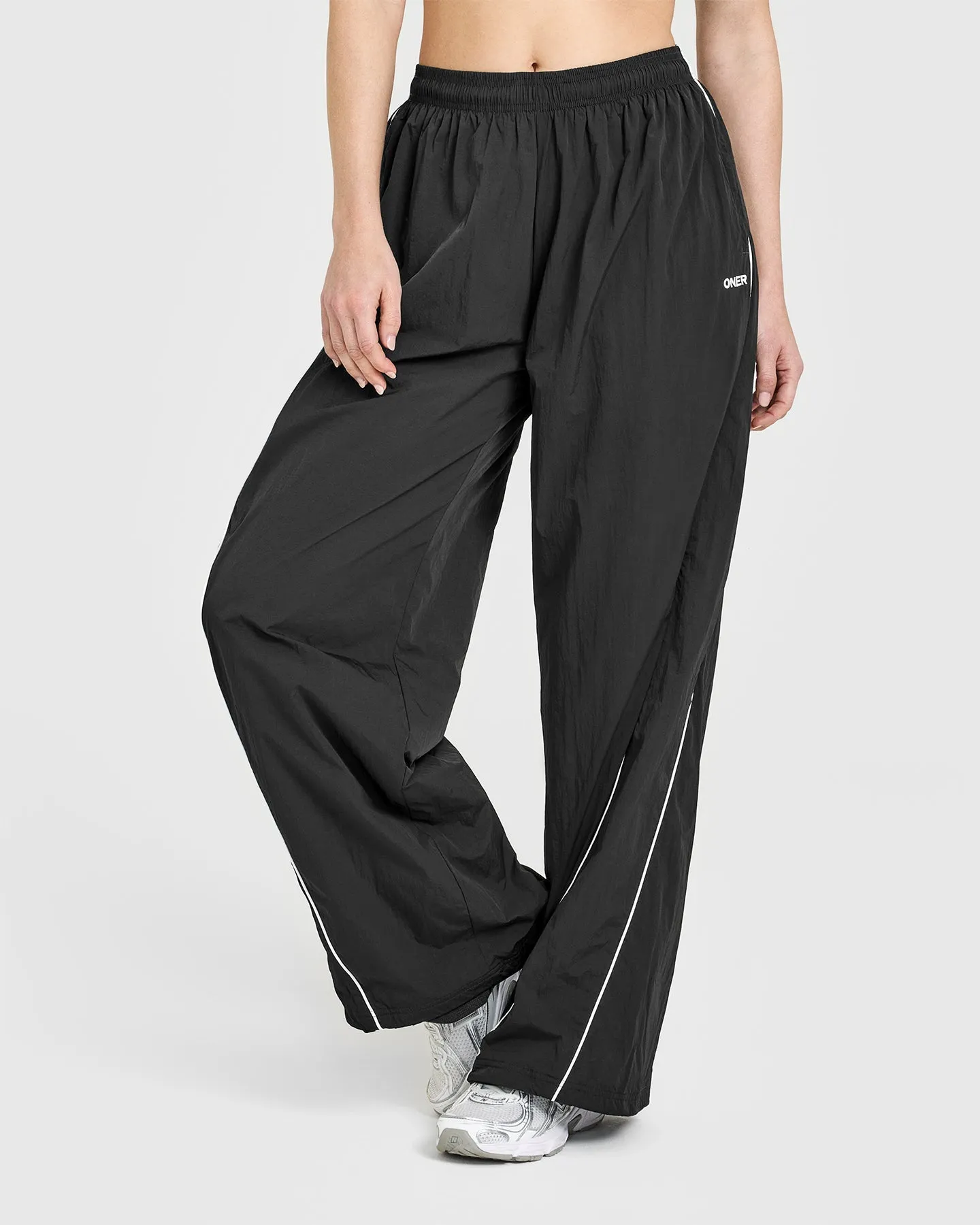 Low Maintenance HypoallergenicFabric Oversized Piped Woven Straight Leg Track Bottoms | Soft Black Casual Look