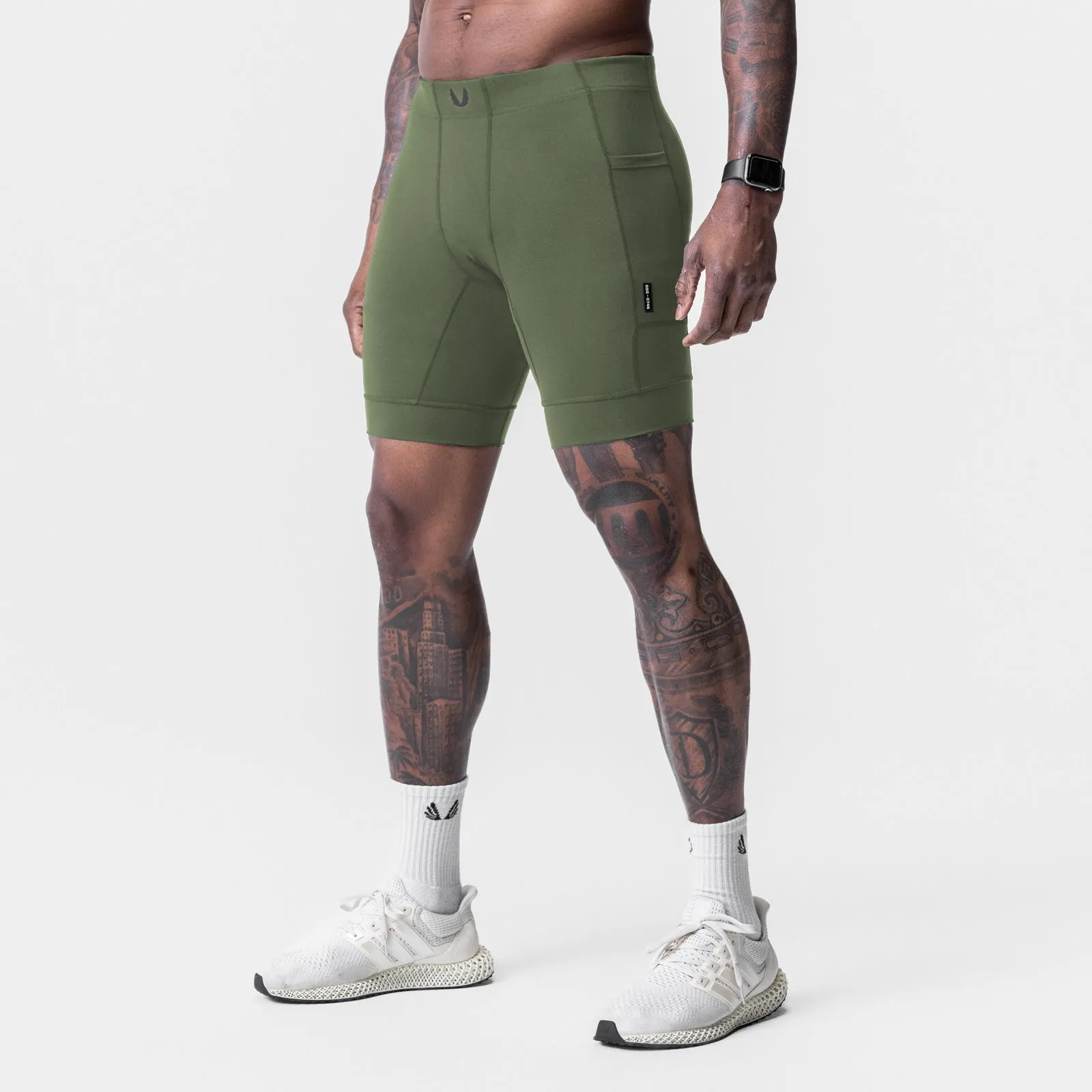 0746. WarpFlexx? Side Pocket 1/2-Length Legging - Olive Fit Design checked shorts