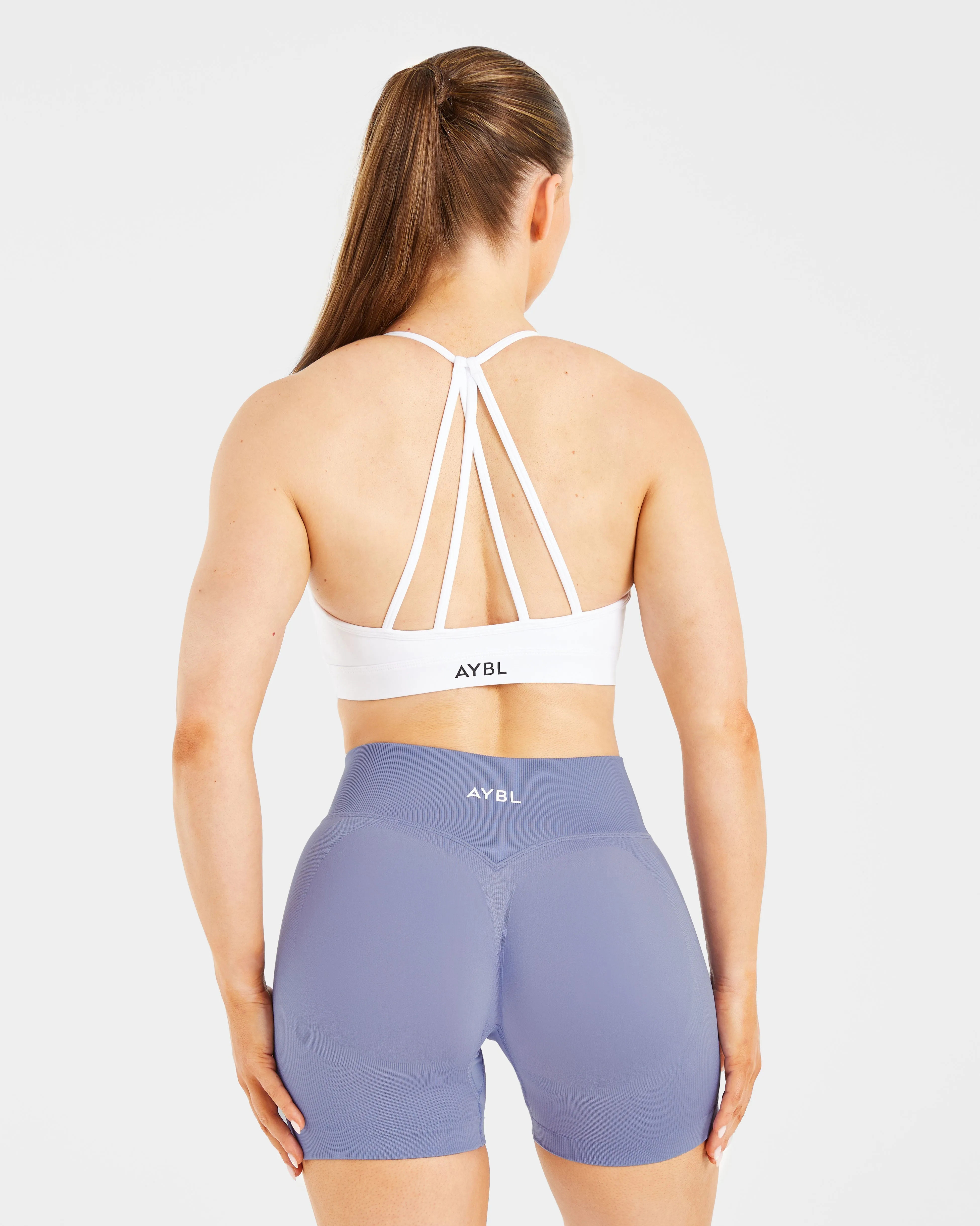 ventilation channels Muscle Support Essential V Neck Strappy Sports Bra - White