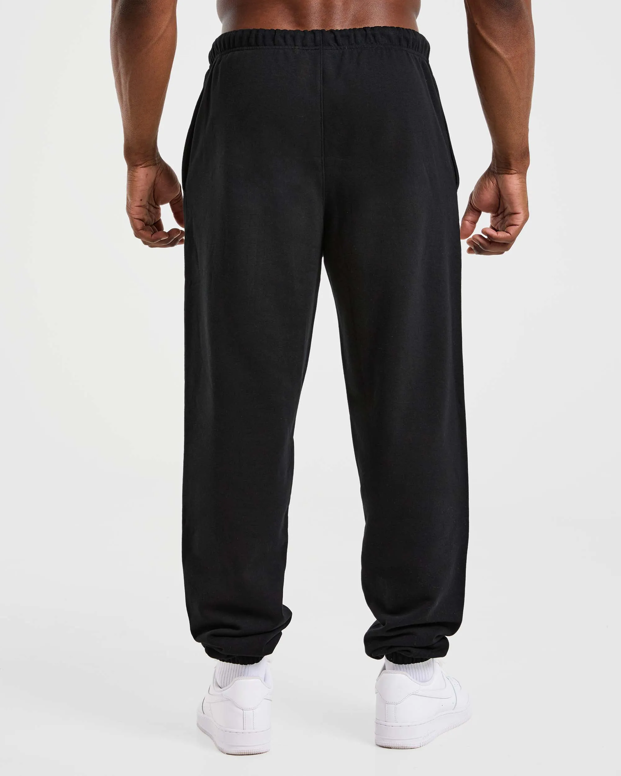 Craft Oversized Joggers - Black Curved Waistline Zipper Closure