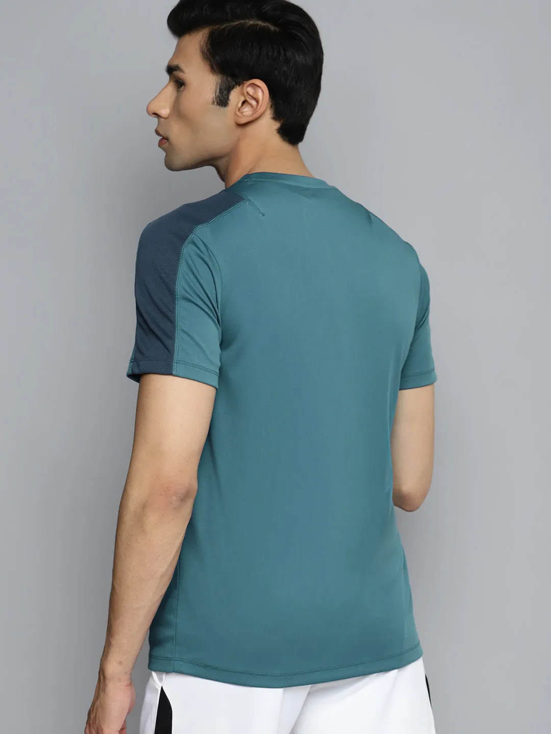Alcis Men Blue Slim Fit Training or Gym T-shirt LowMaintenanceFabric Pure Core