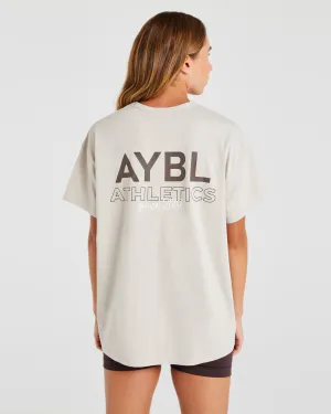 Compression Support Zone AYBL Athletics Oversized T Shirt - Beige Move Freely Chic Comfort