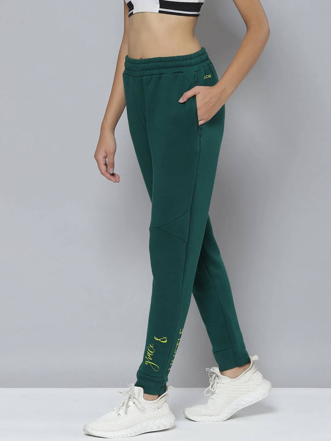 WindResistantMaterial Modular Pocket System Alcis Women Green Typography Printed Slim Fit Sports Joggers