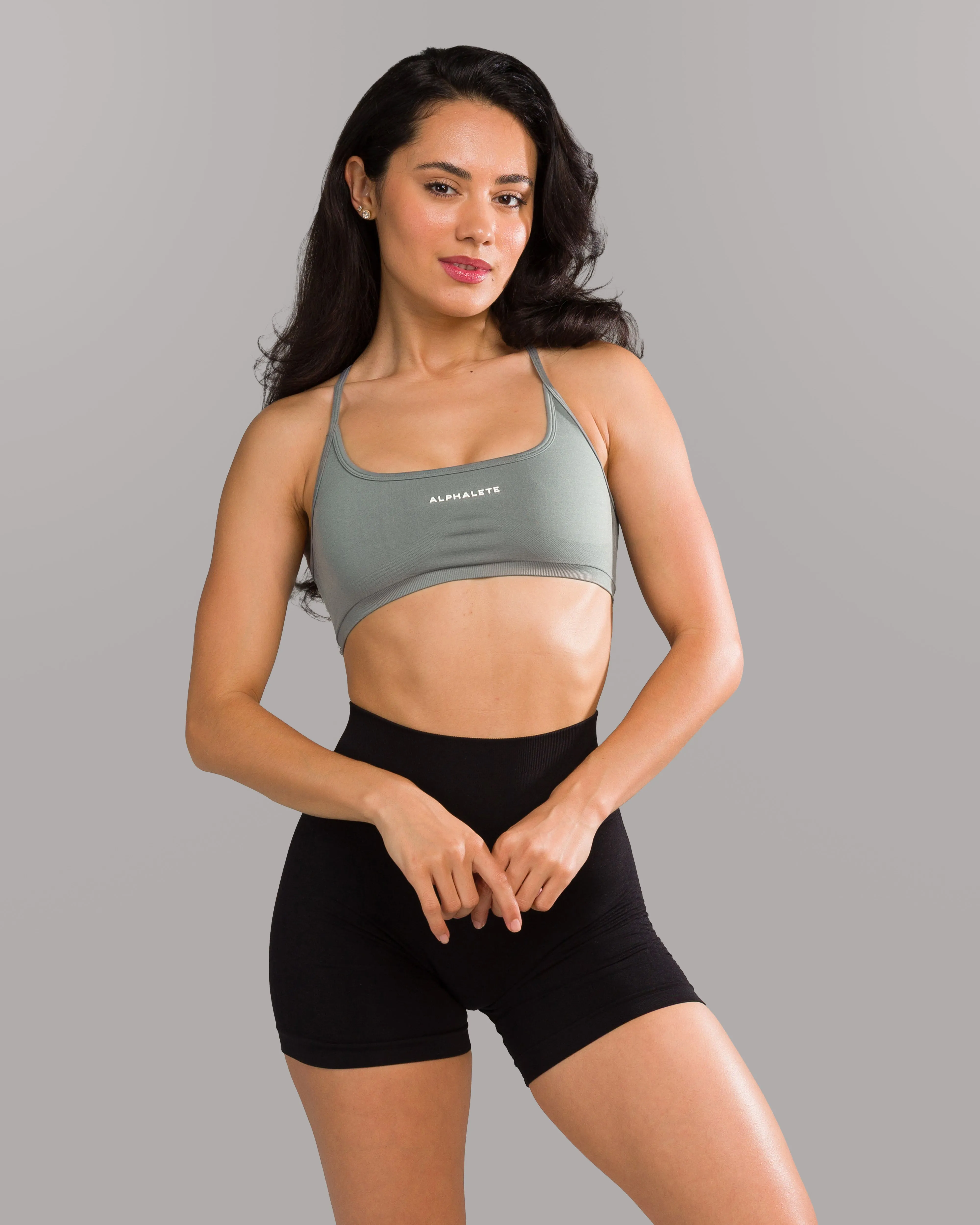Pilates studio clients indoor exercise Amplify Open Back Bra - Ride