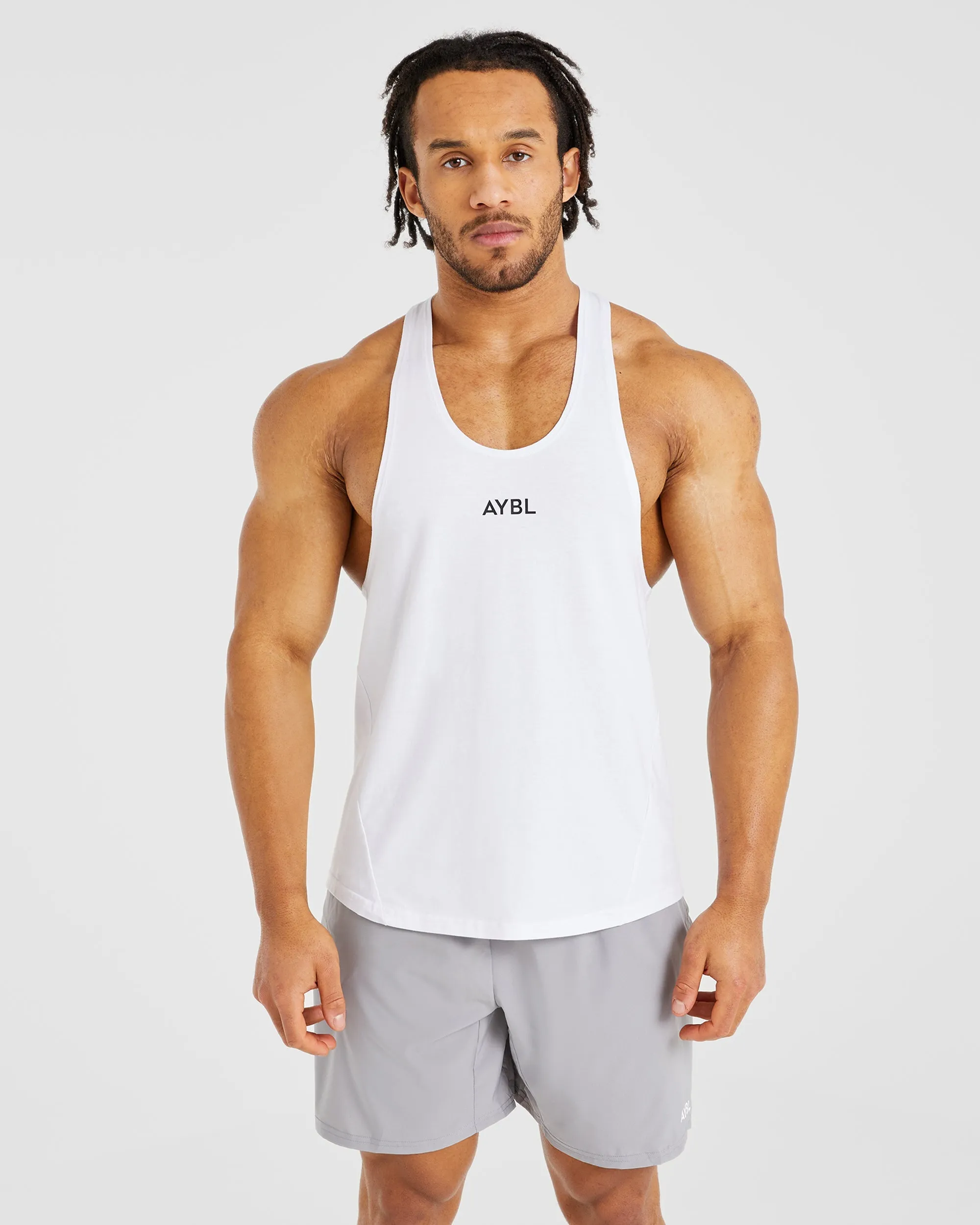 Functional Layer Essential Stringer - White Flatlock Stitching Technology