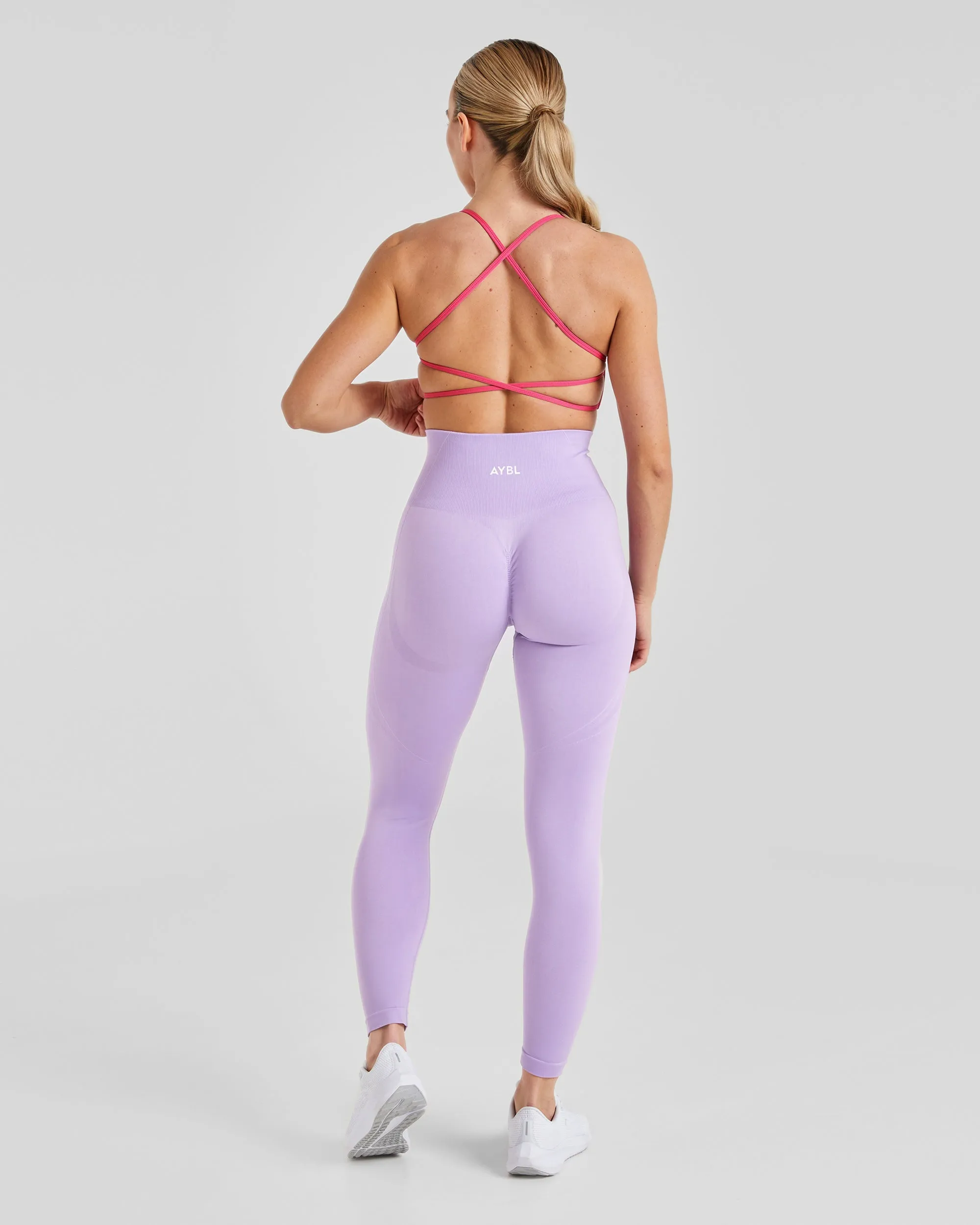 Essential Crossback Sports Bra - Hot Pink Pilates practitioners