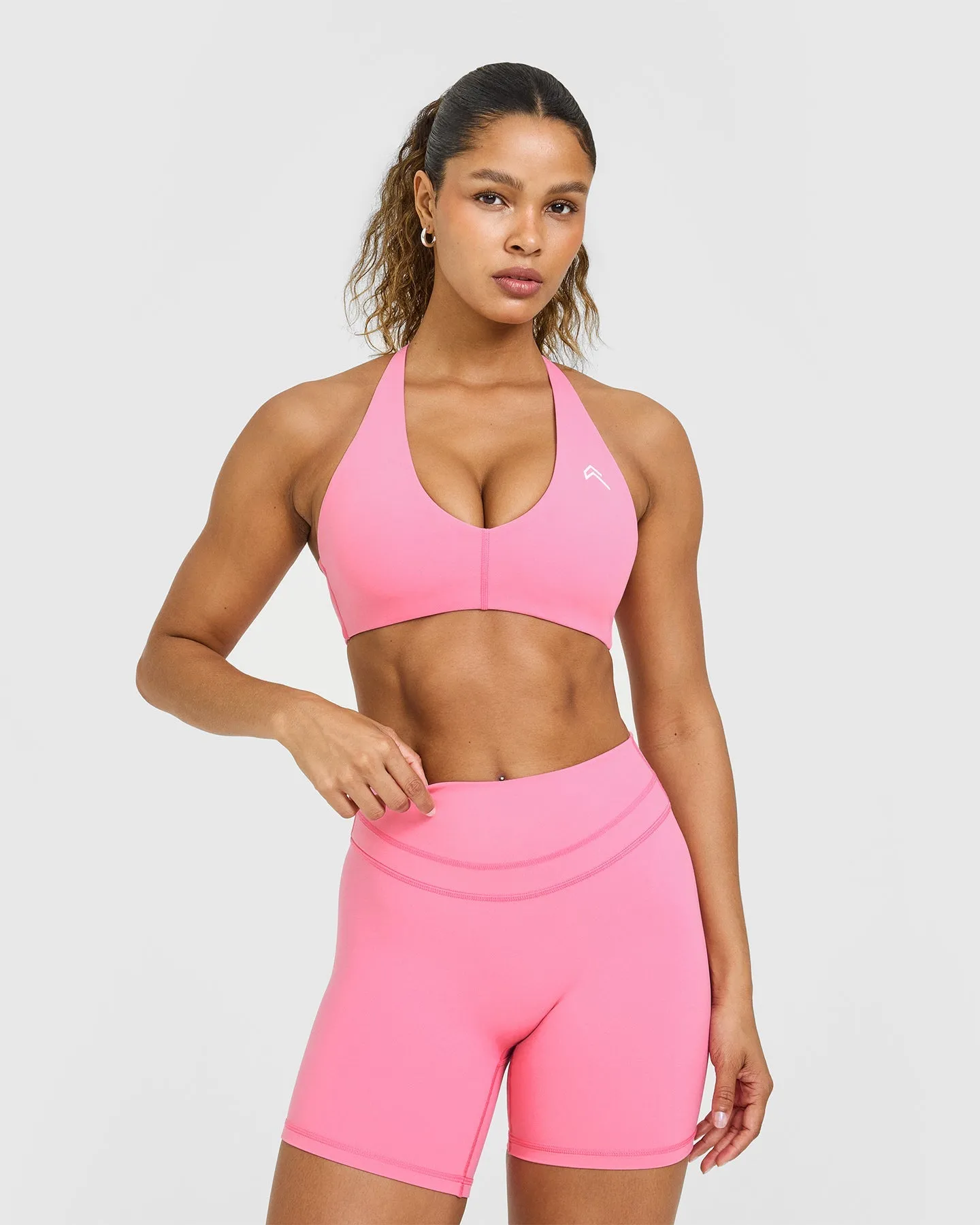 Wear under clothes seams Cross Back Closure Unified Micro Bralette White Logo | Peony Pink Back support